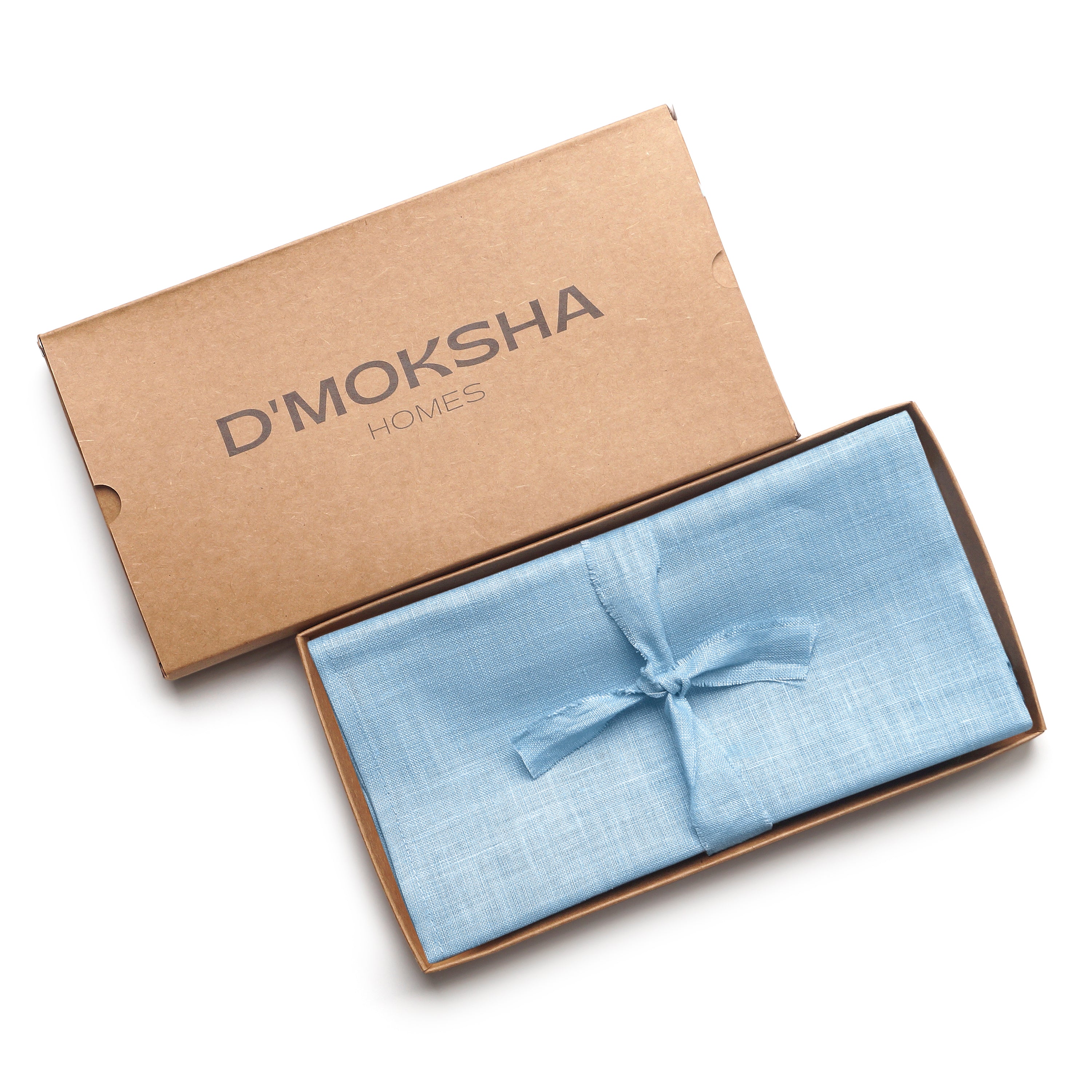 Close-up of the mitered corners on powder blue pure linen dinner napkins