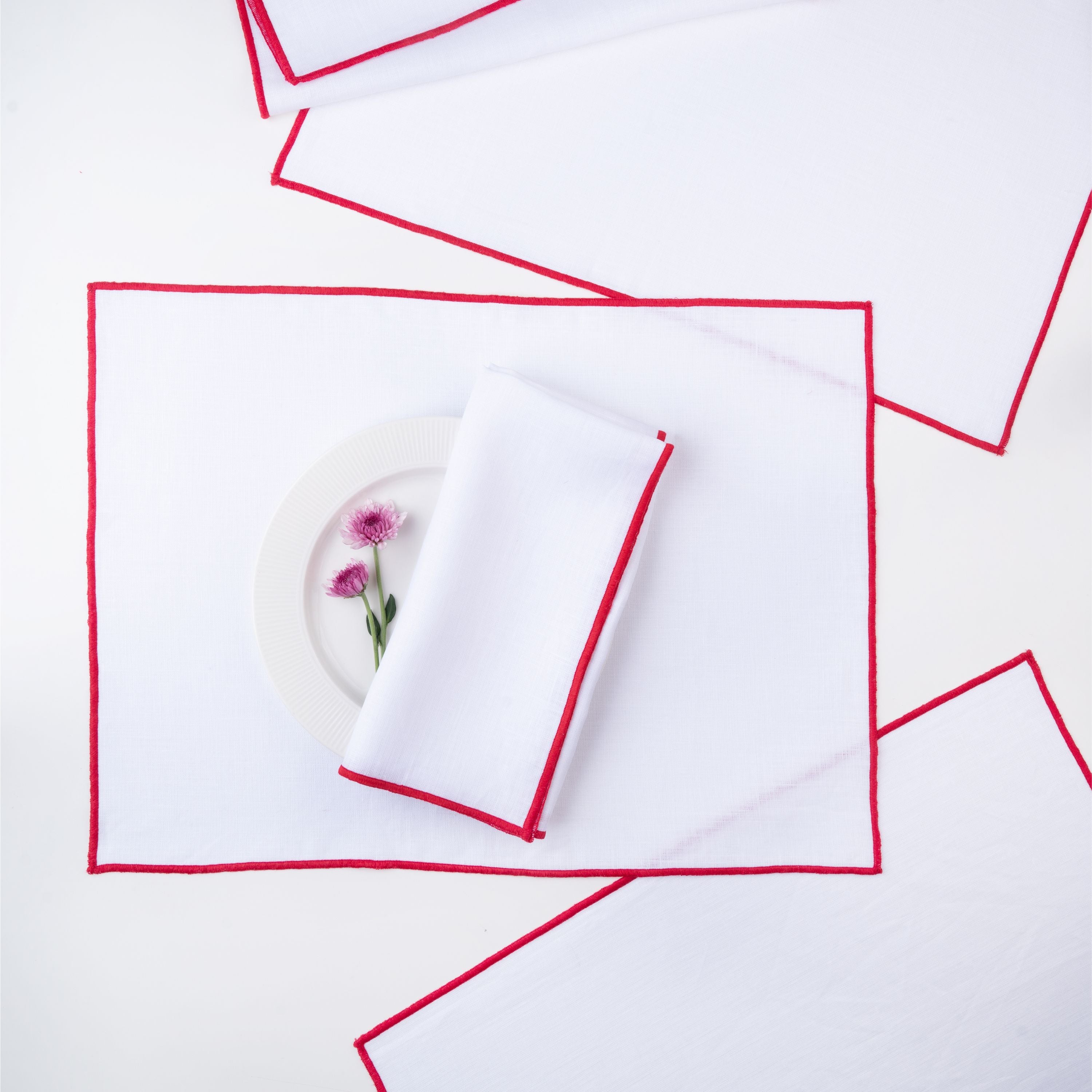 White and red pure linen placemats with matching D'Moksha table linens