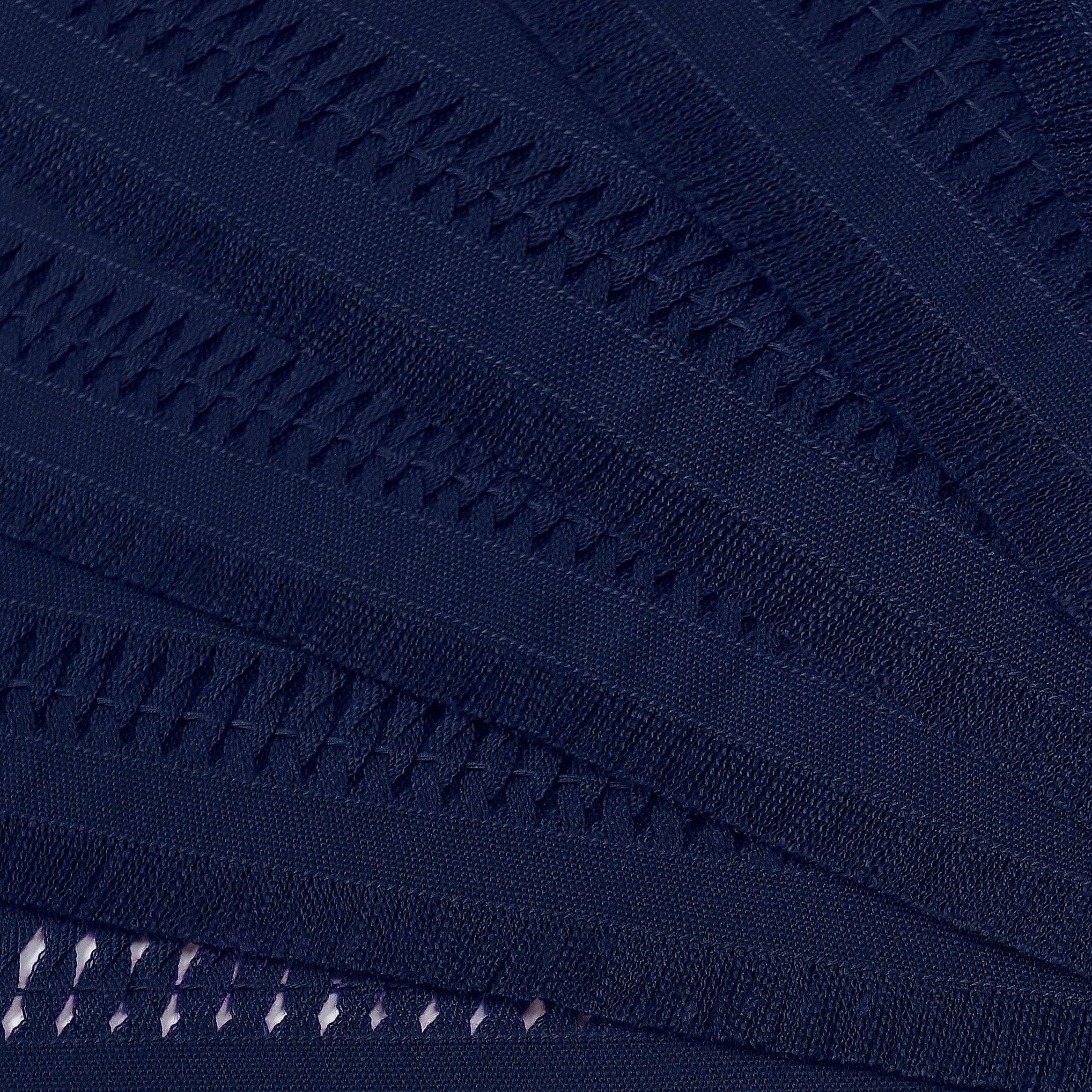 Close-up of the hand-hemstitch edge on navy blue faux linen placemats