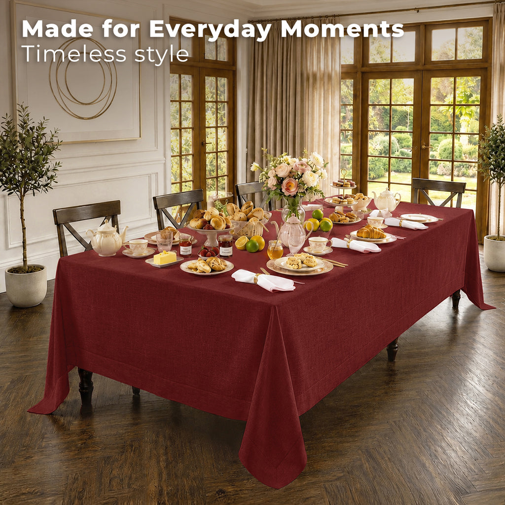 Close-up of the mitered corners on a dark red pure linen tablecloth