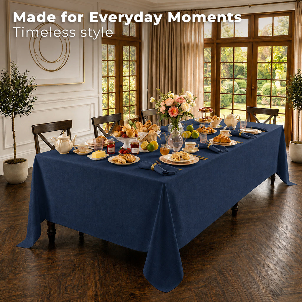 Close-up of the mitered corners on a navy blue pure linen tablecloth
