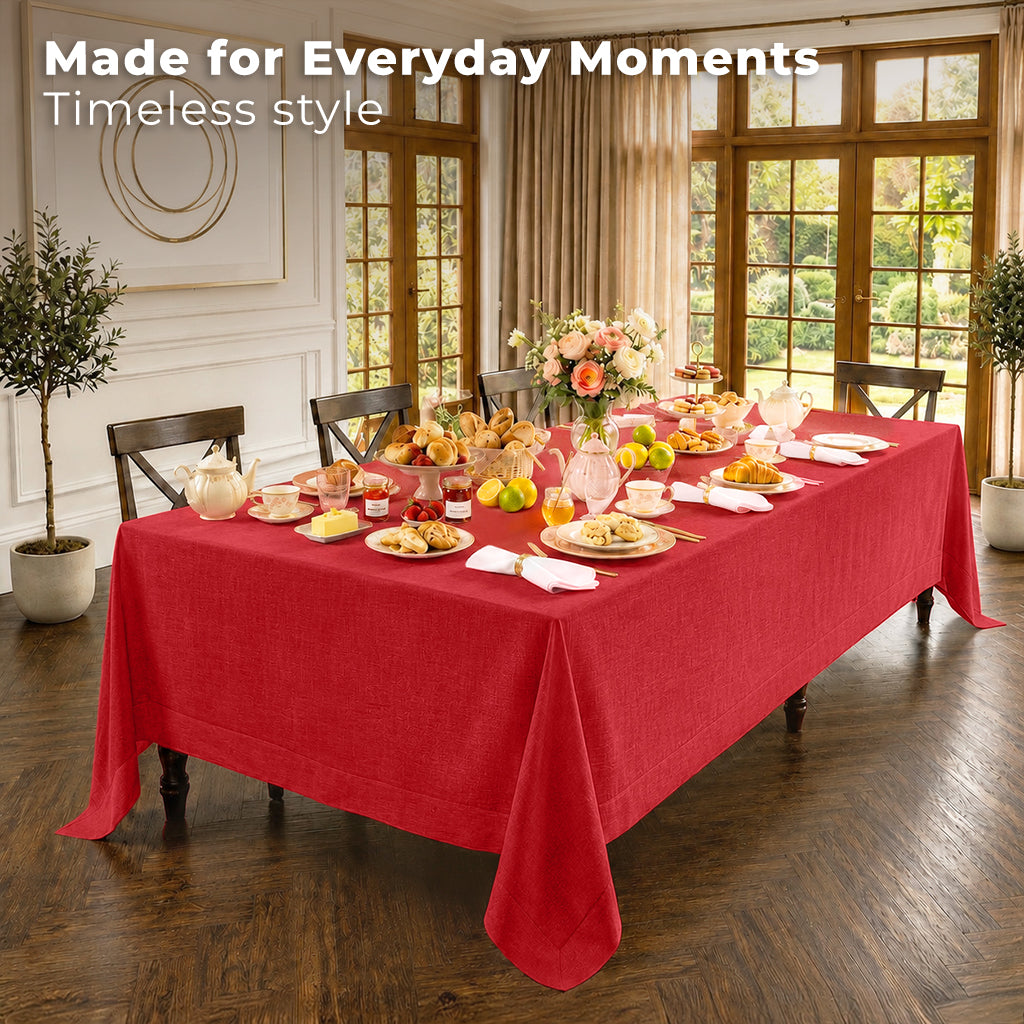 Close-up of the mitered corners on a bright red pure linen tablecloth