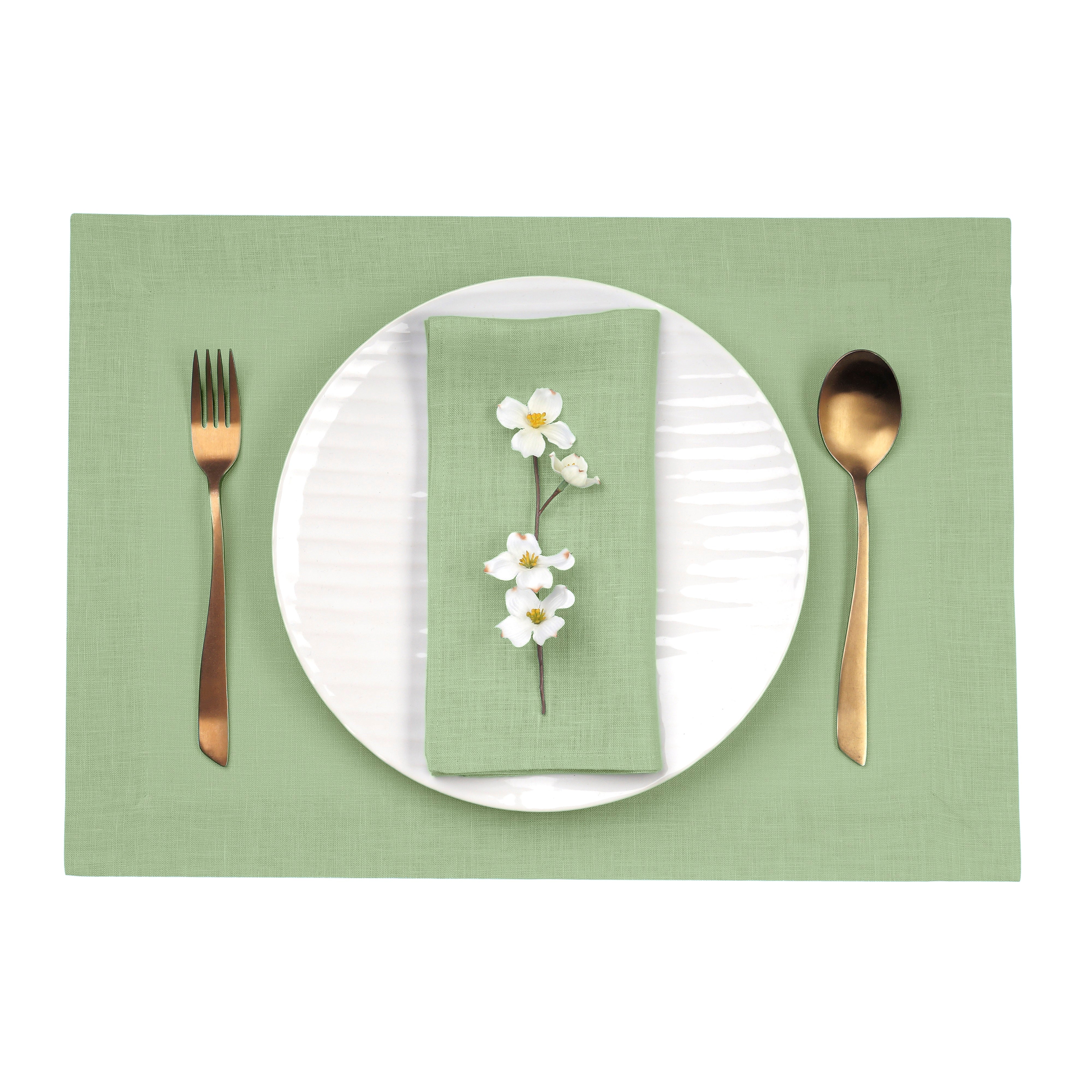 Close-up of the mitered corners on sage green pure linen placemats