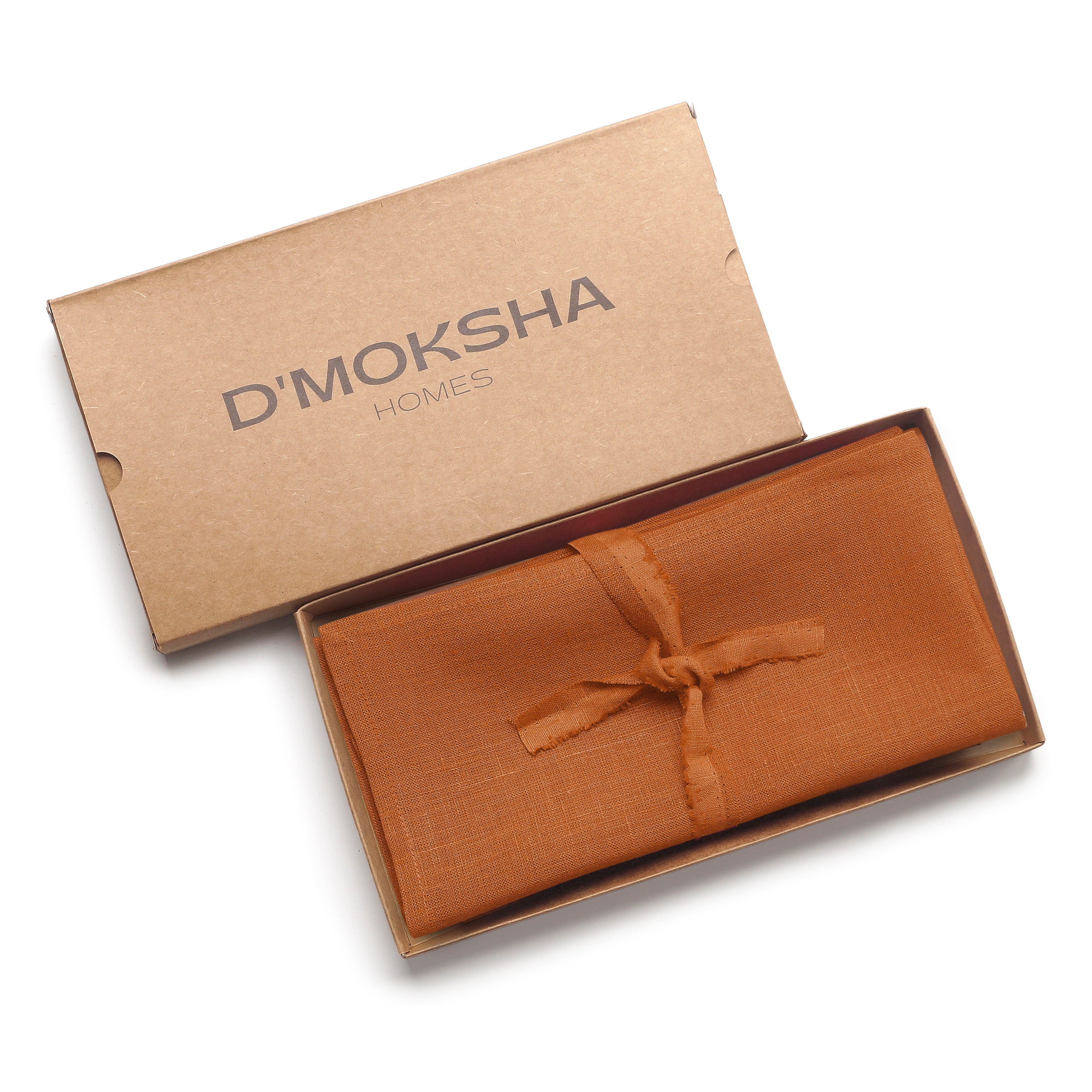 Close-up of the mitered corners on rust pure linen dinner napkins