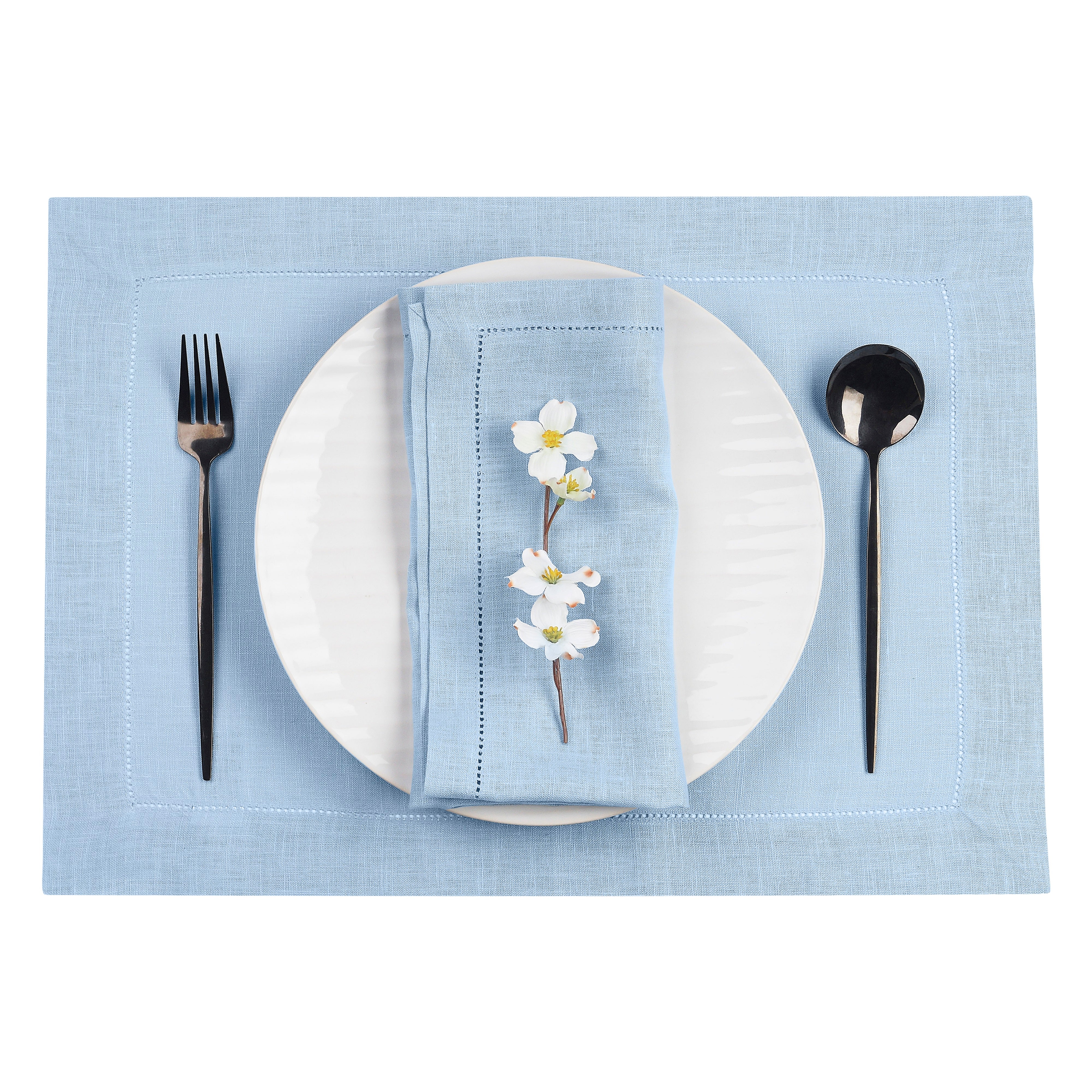 Close-up of the hemstitch edge on powder blue pure linen placemats