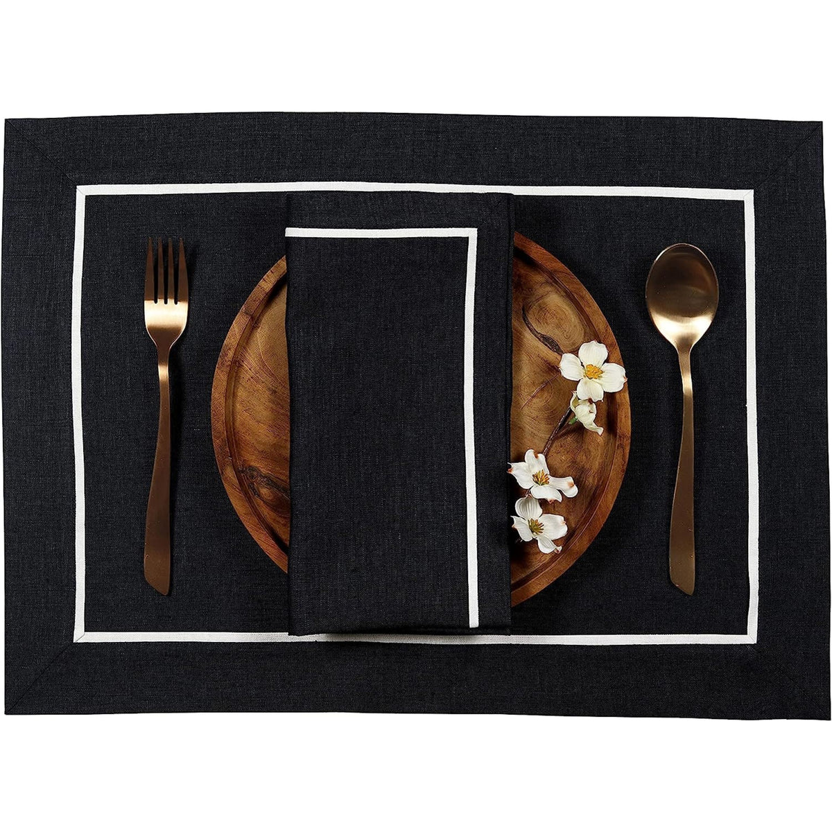 Black and white pure linen dinner napkins in a set table setting