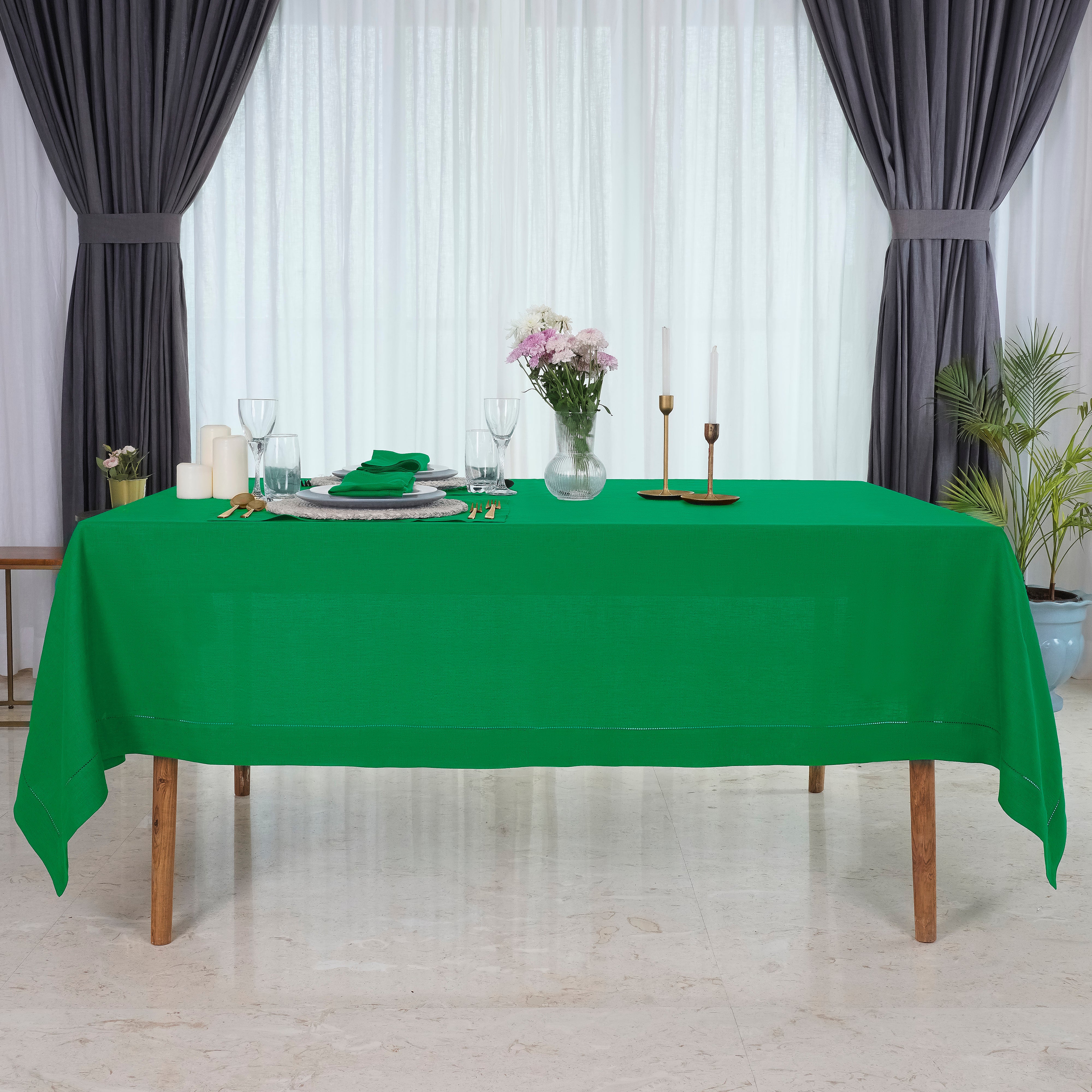 Close-up of the hemstitch edge on a kelly green pure linen tablecloth