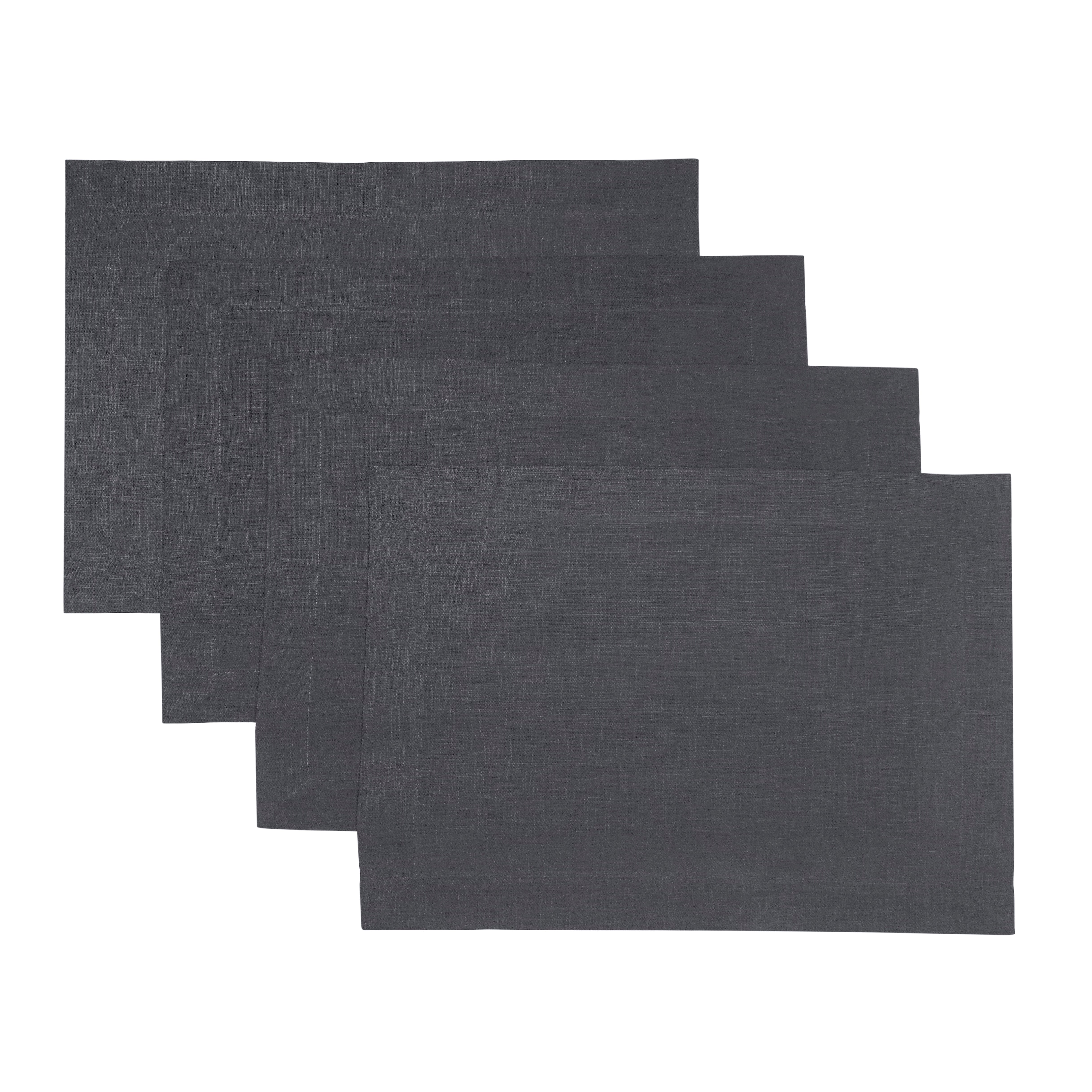 Charcoal grey linen placemats styled on a dining table