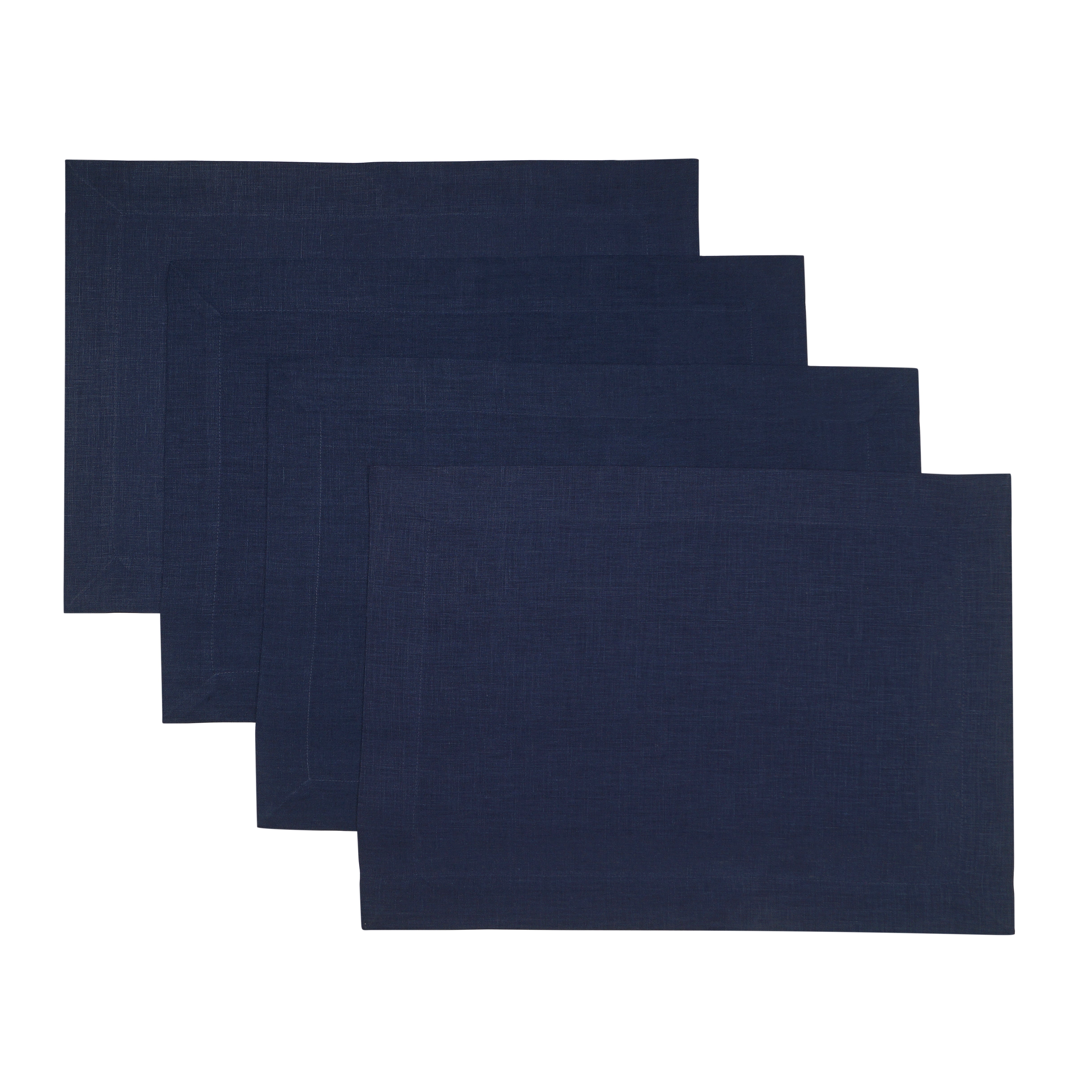 Navy blue linen placemats styled on a dining table