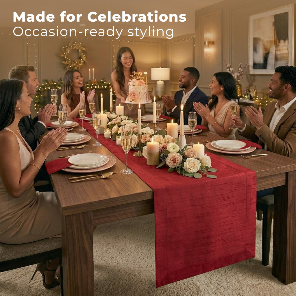 Close-up of the mitered corners on a tango red Luxe Shine table runner