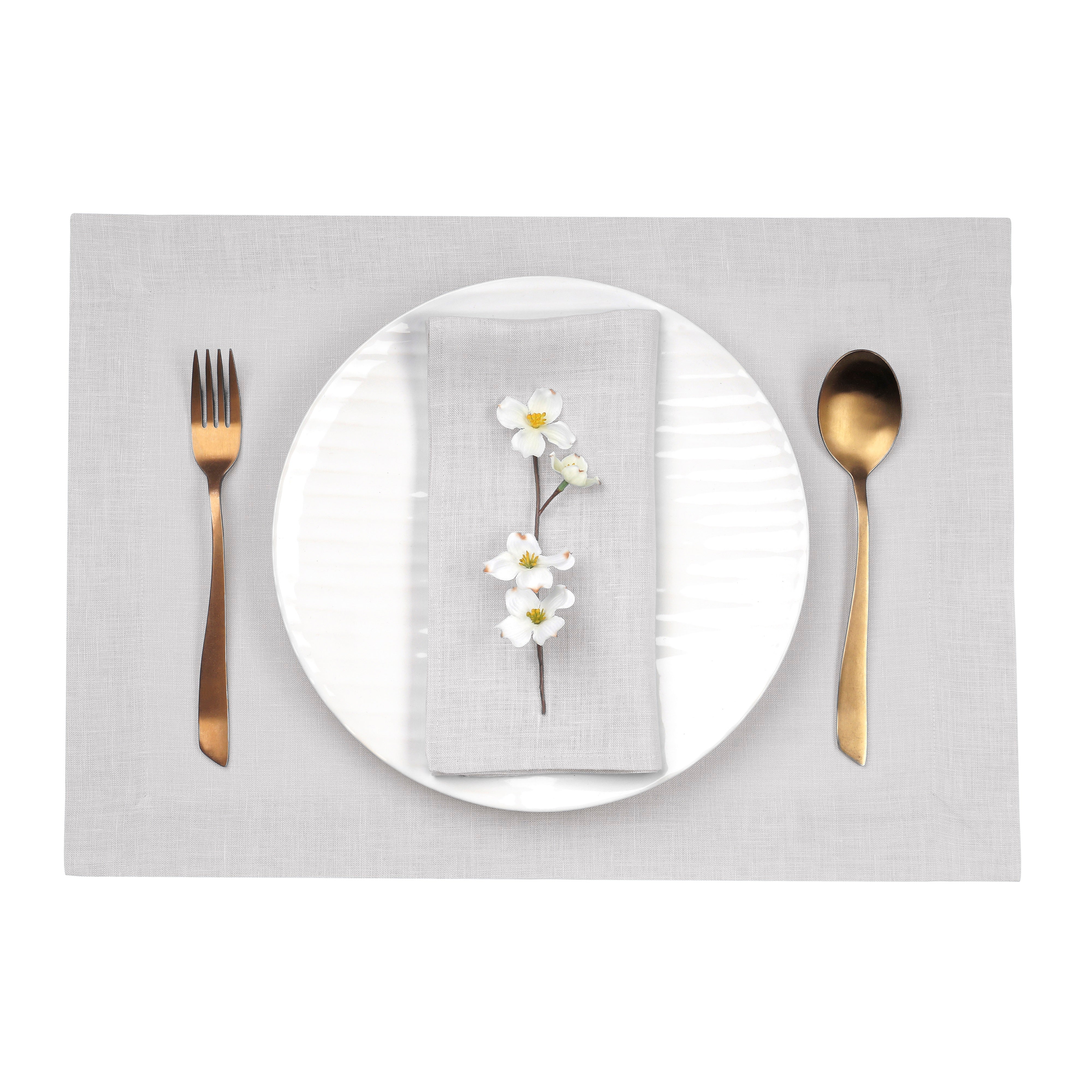 Close-up of the mitered corners on silver grey pure linen placemats
