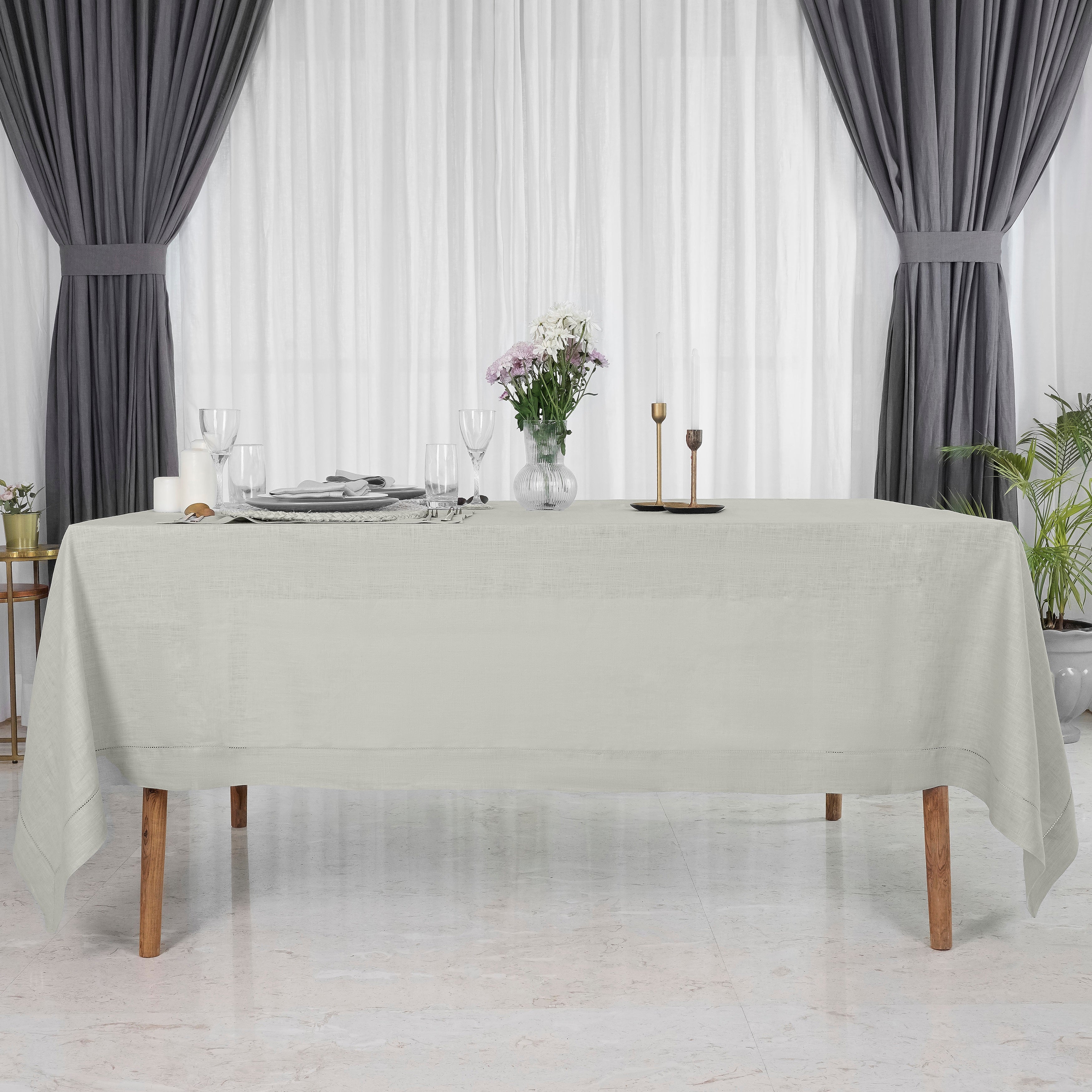 Close-up of the hemstitch edge on a silver grey pure linen tablecloth