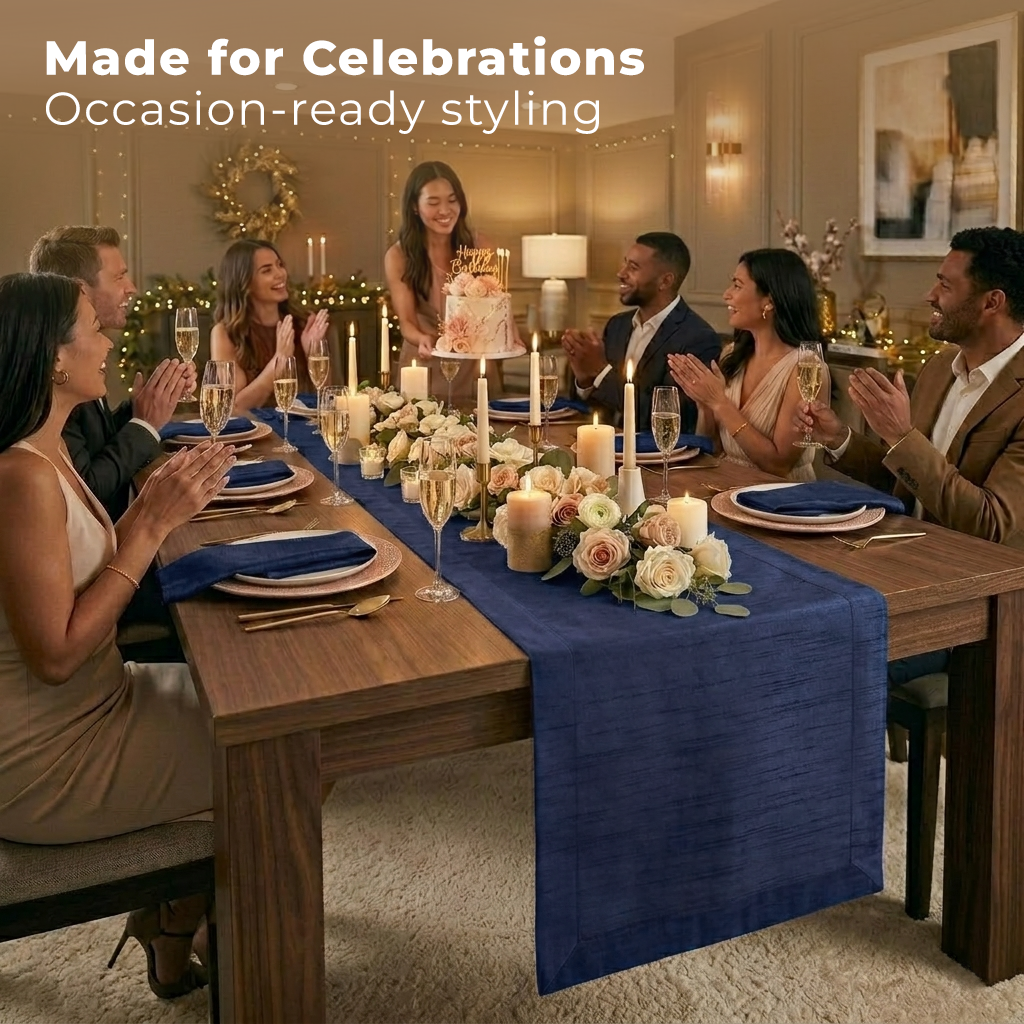 Close-up of the mitered corners on a navy blue Luxe Shine table runner