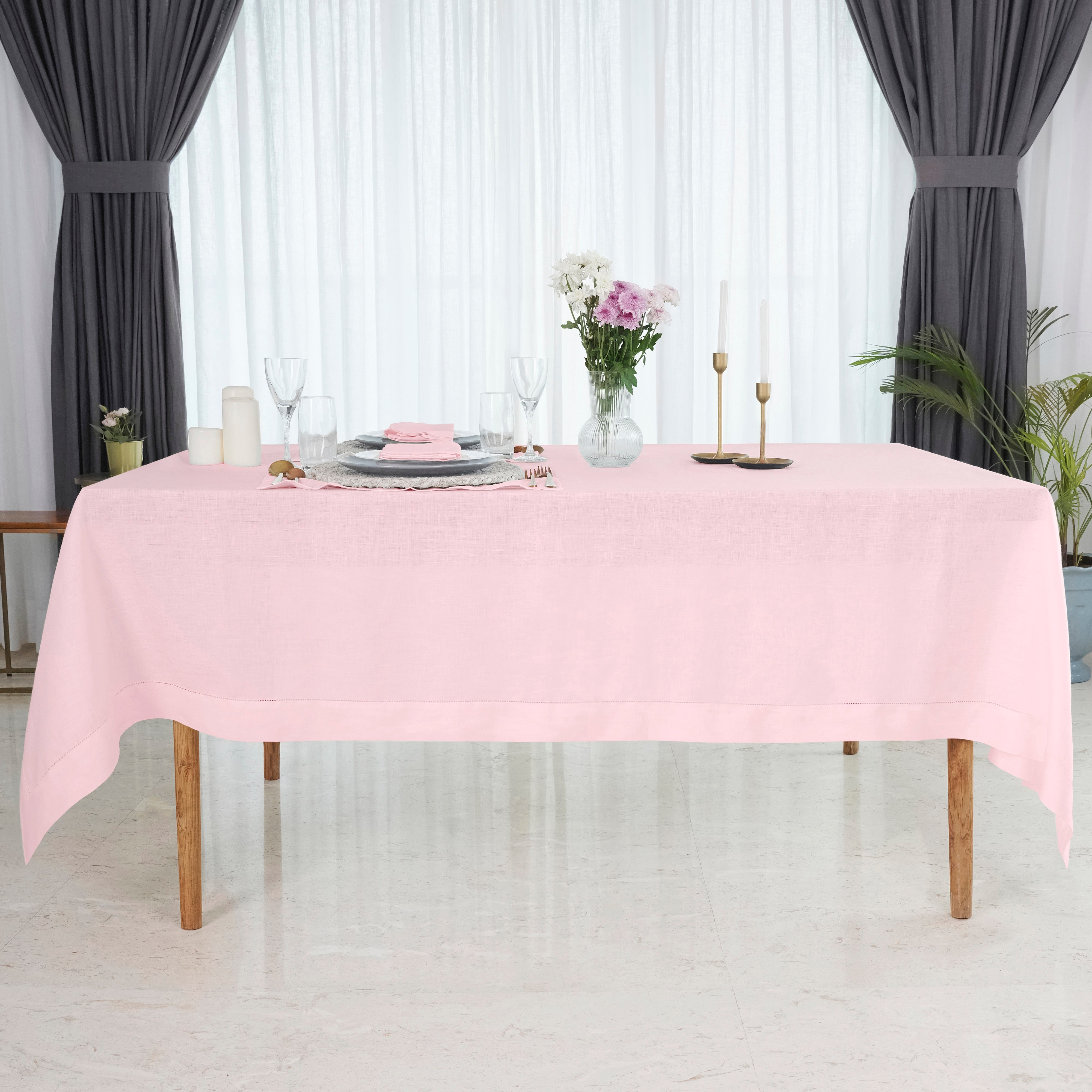 Close-up of the hemstitch edge on a pastel pink pure linen tablecloth