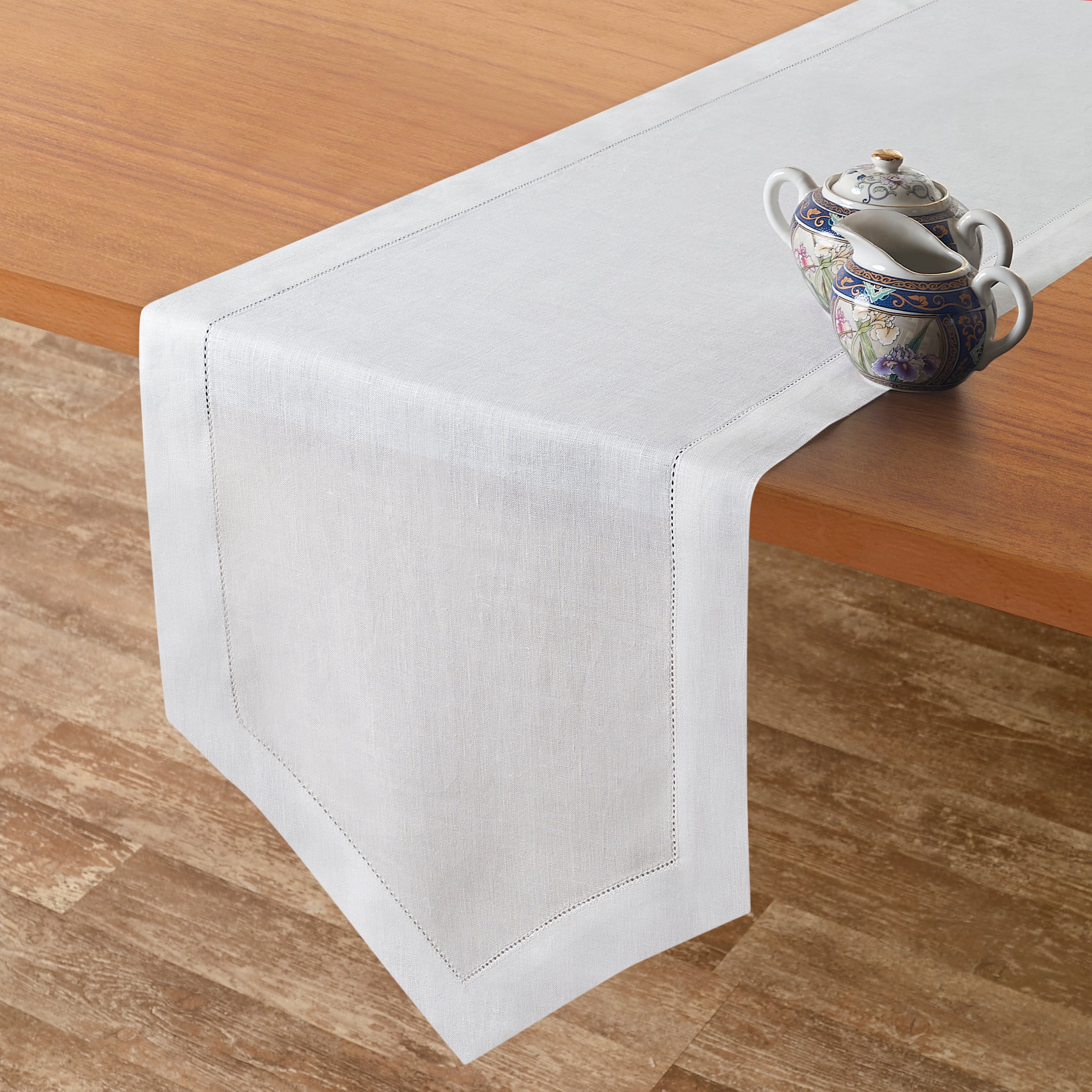 Close-up of the weave on a white pure linen table runner