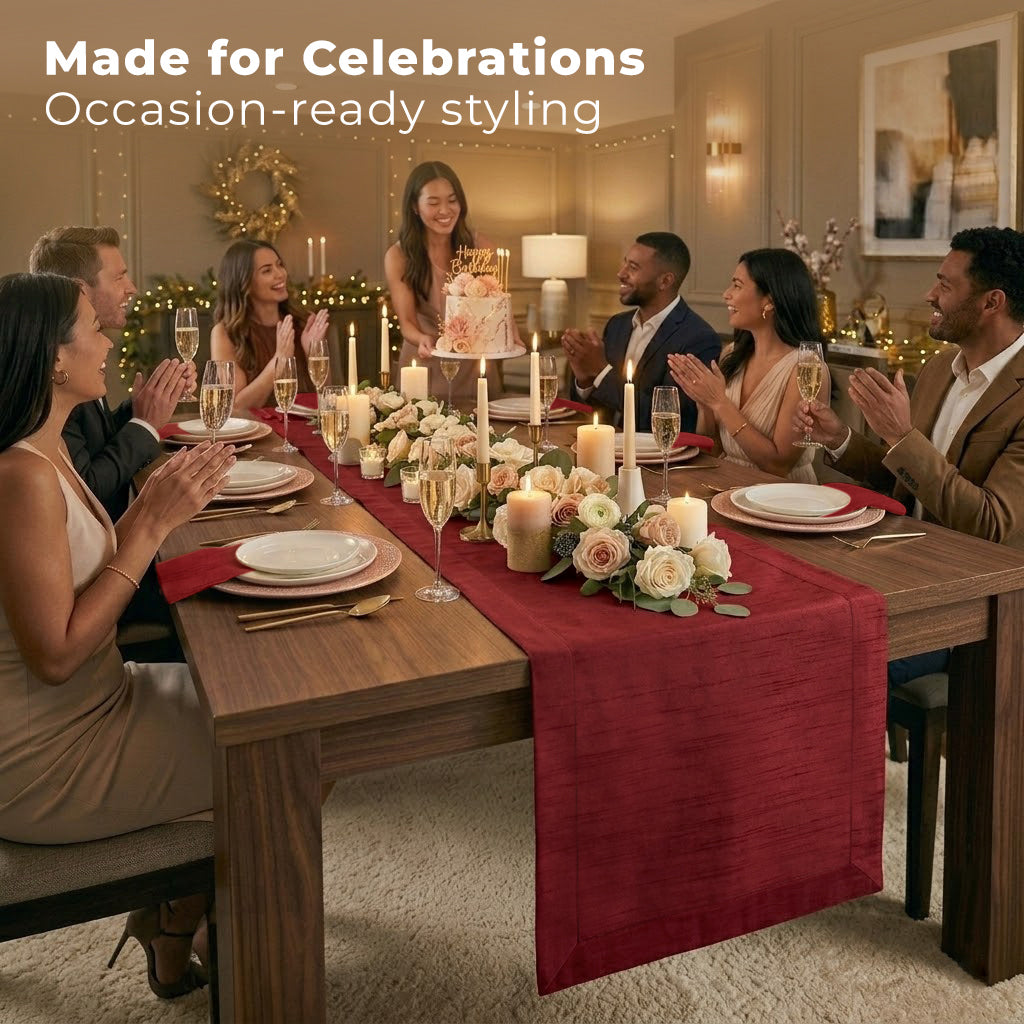 Close-up of the mitered corners on a red Luxe Shine table runner
