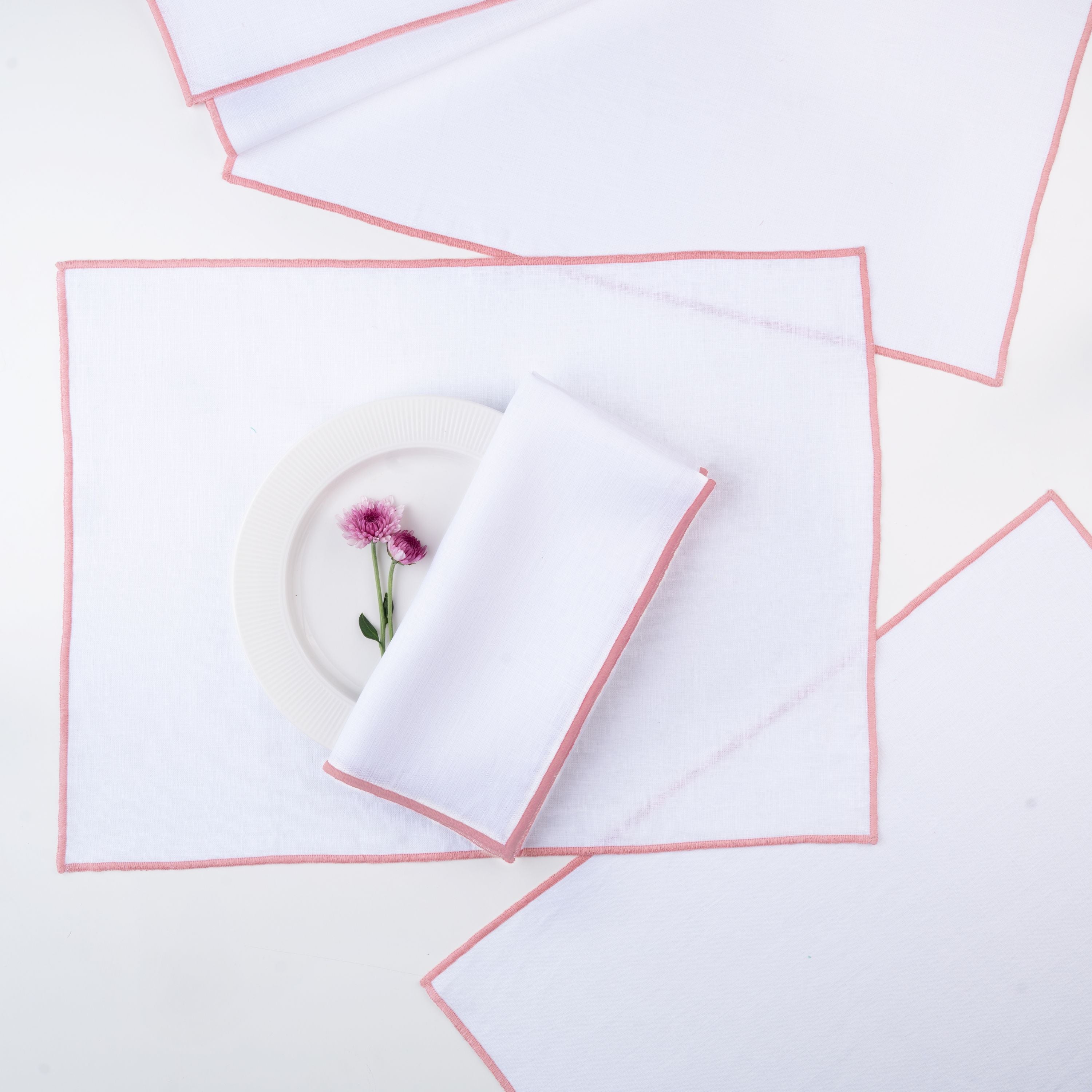 White and dusty pink pure linen placemats with matching D'Moksha table linens