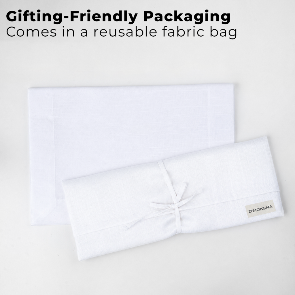 White Luxe Shine placemats with matching D'Moksha table linens