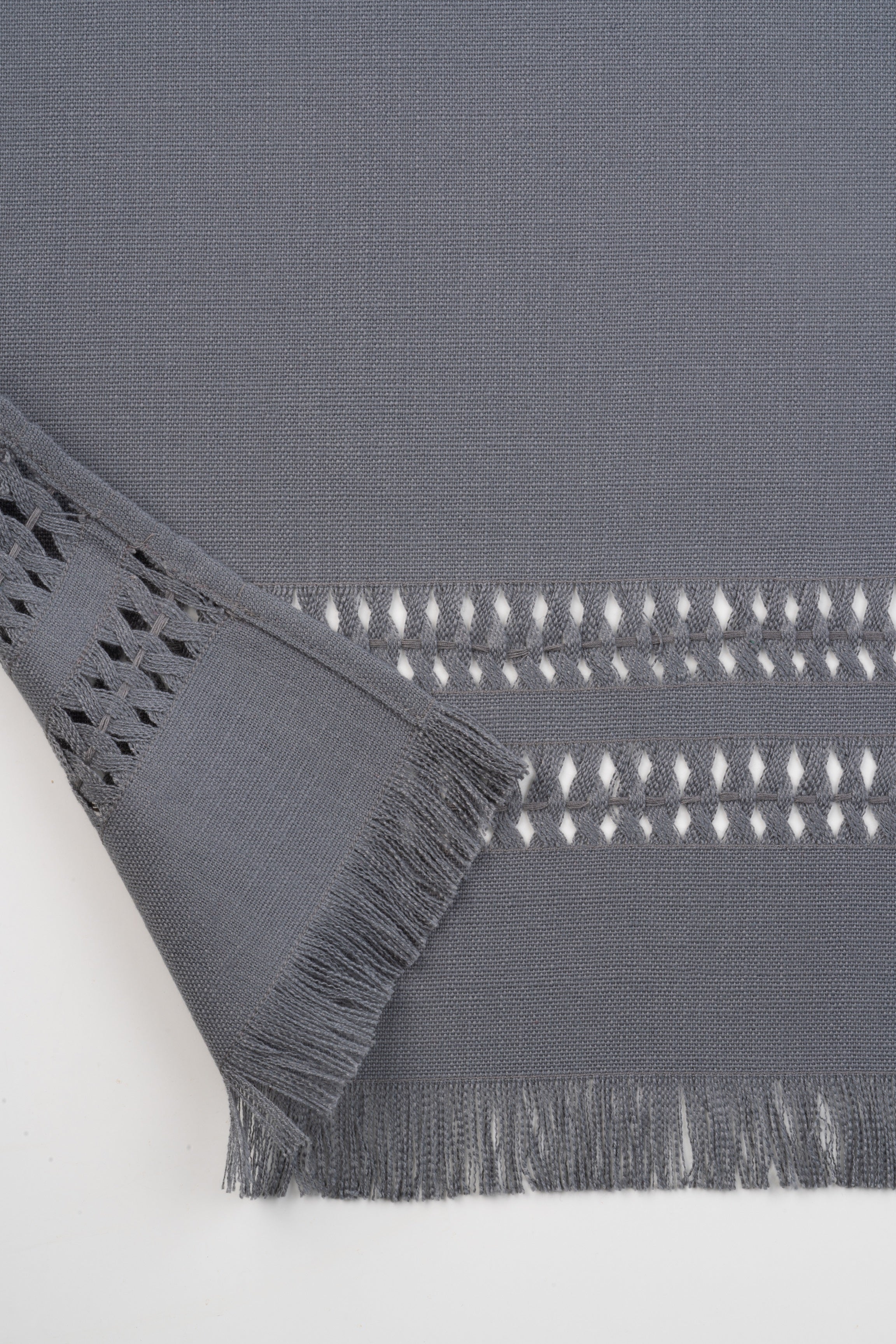 Charcoal grey faux linen table runner with matching D'Moksha table linens