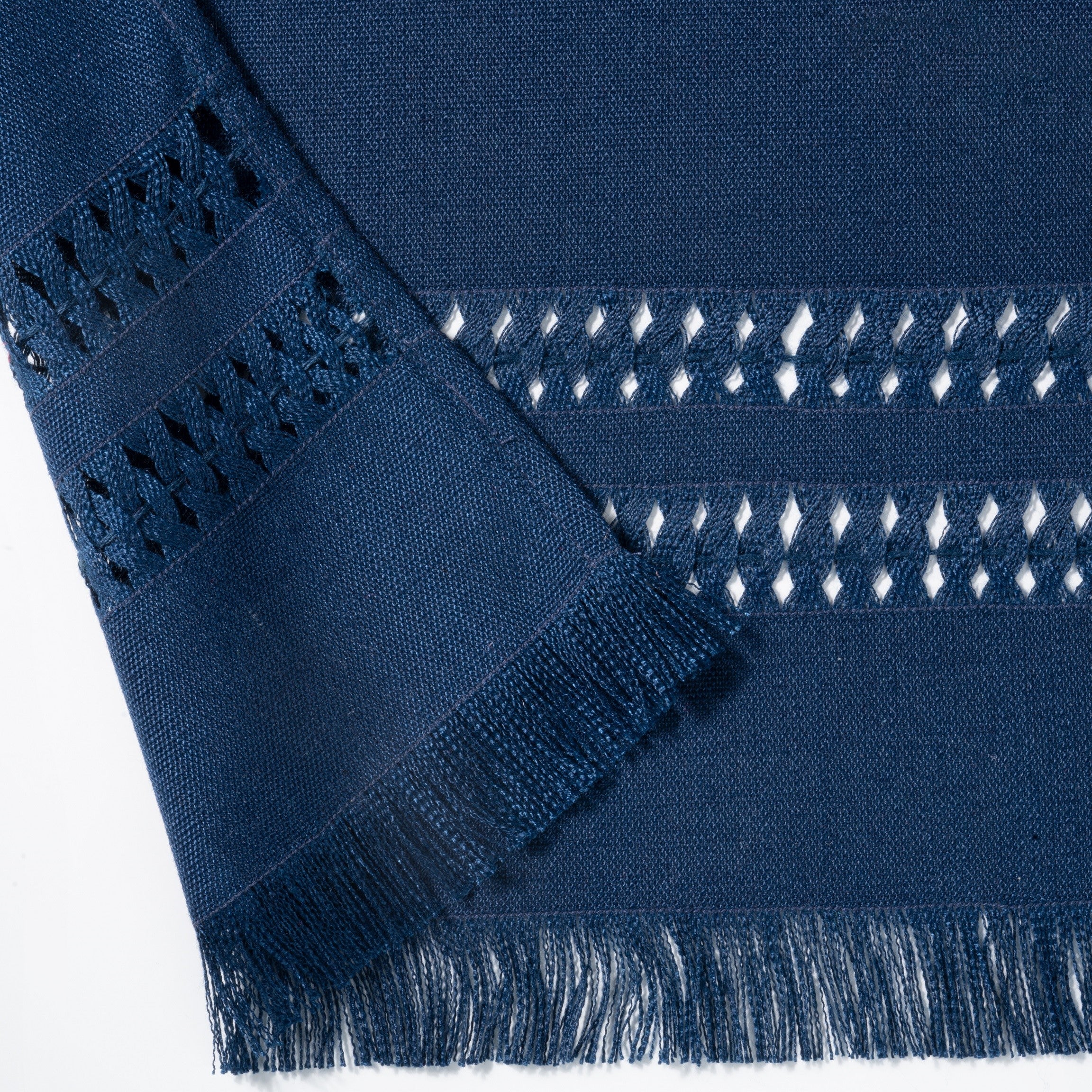 Navy blue faux linen table runner with matching D'Moksha table linens