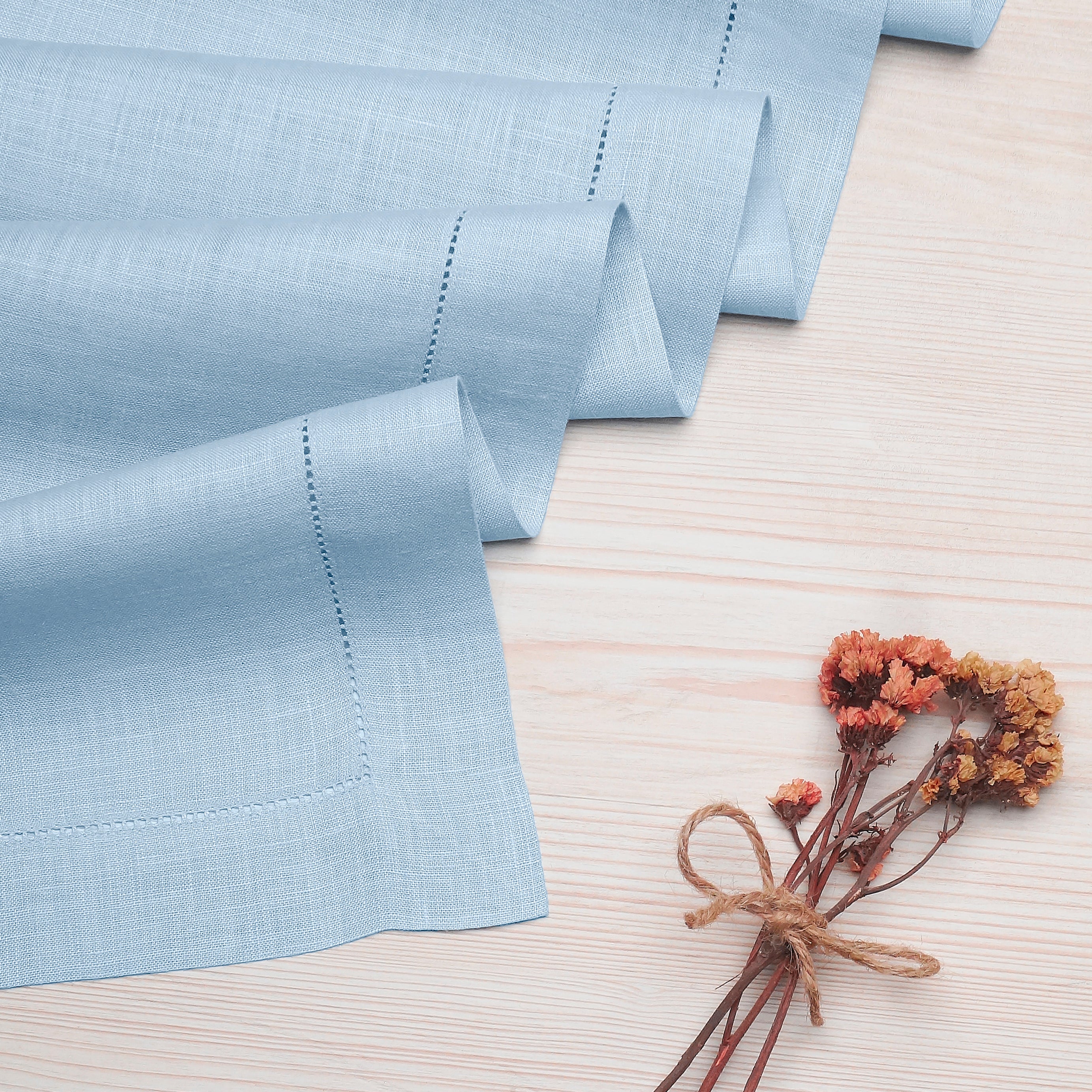 Powder blue pure linen table runner with matching D'Moksha table linens