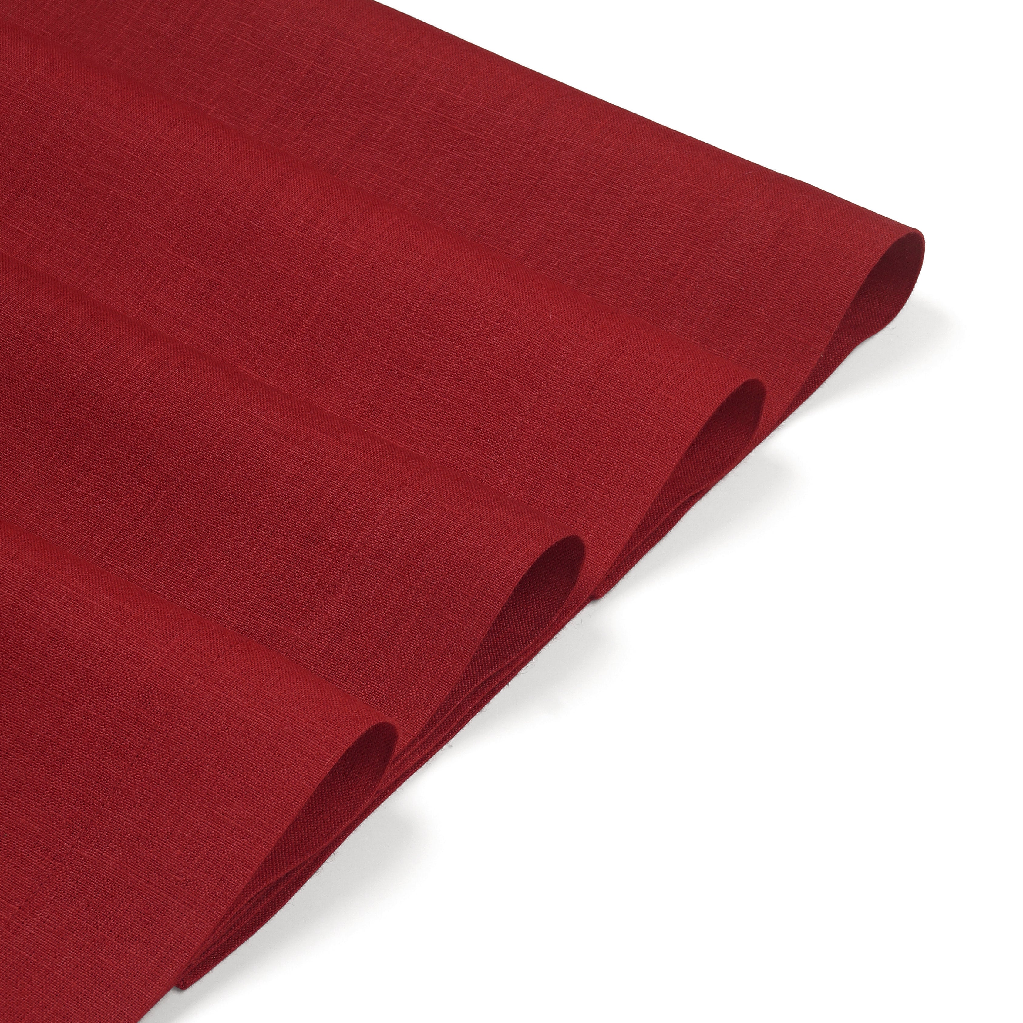 Red linen placemats with matching D'Moksha table linens