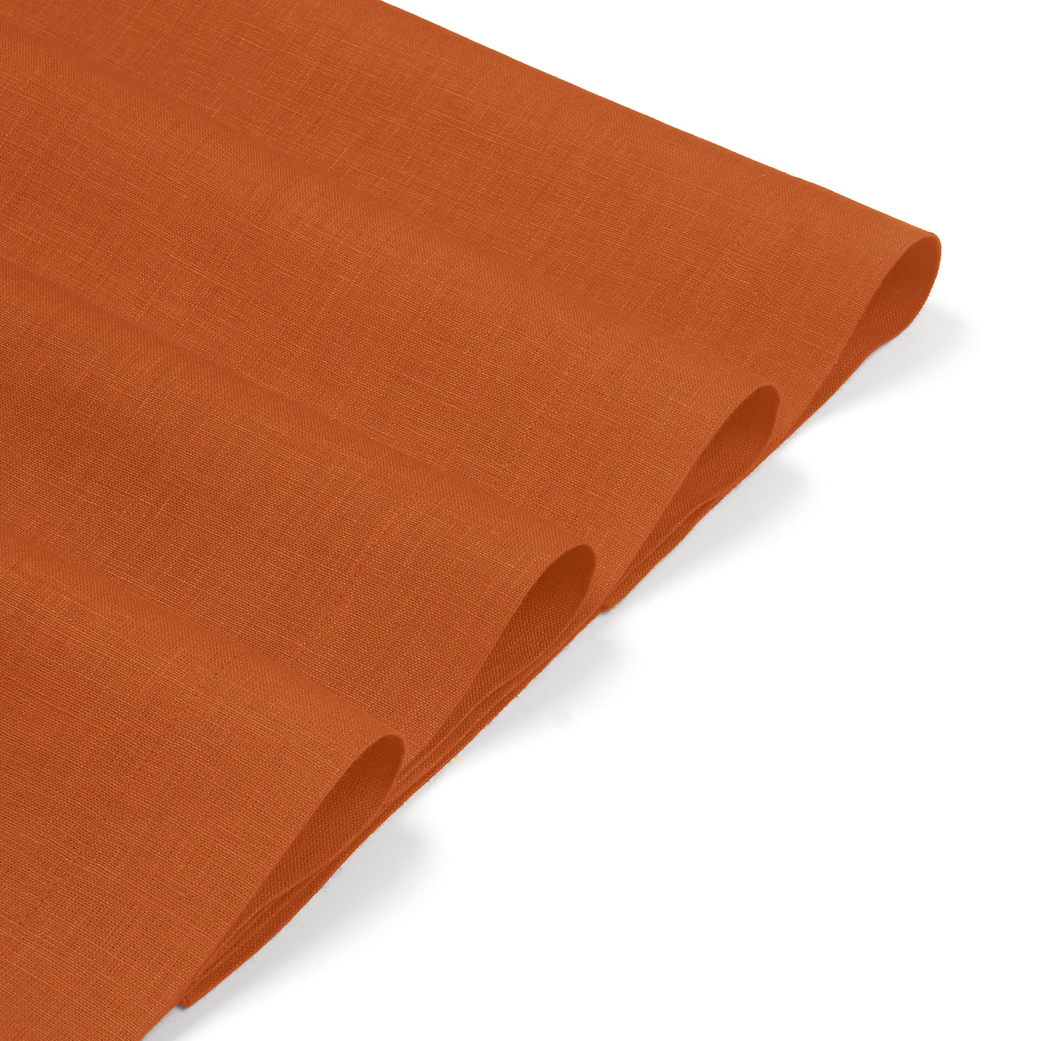 Rust linen placemats with matching D'Moksha table linens