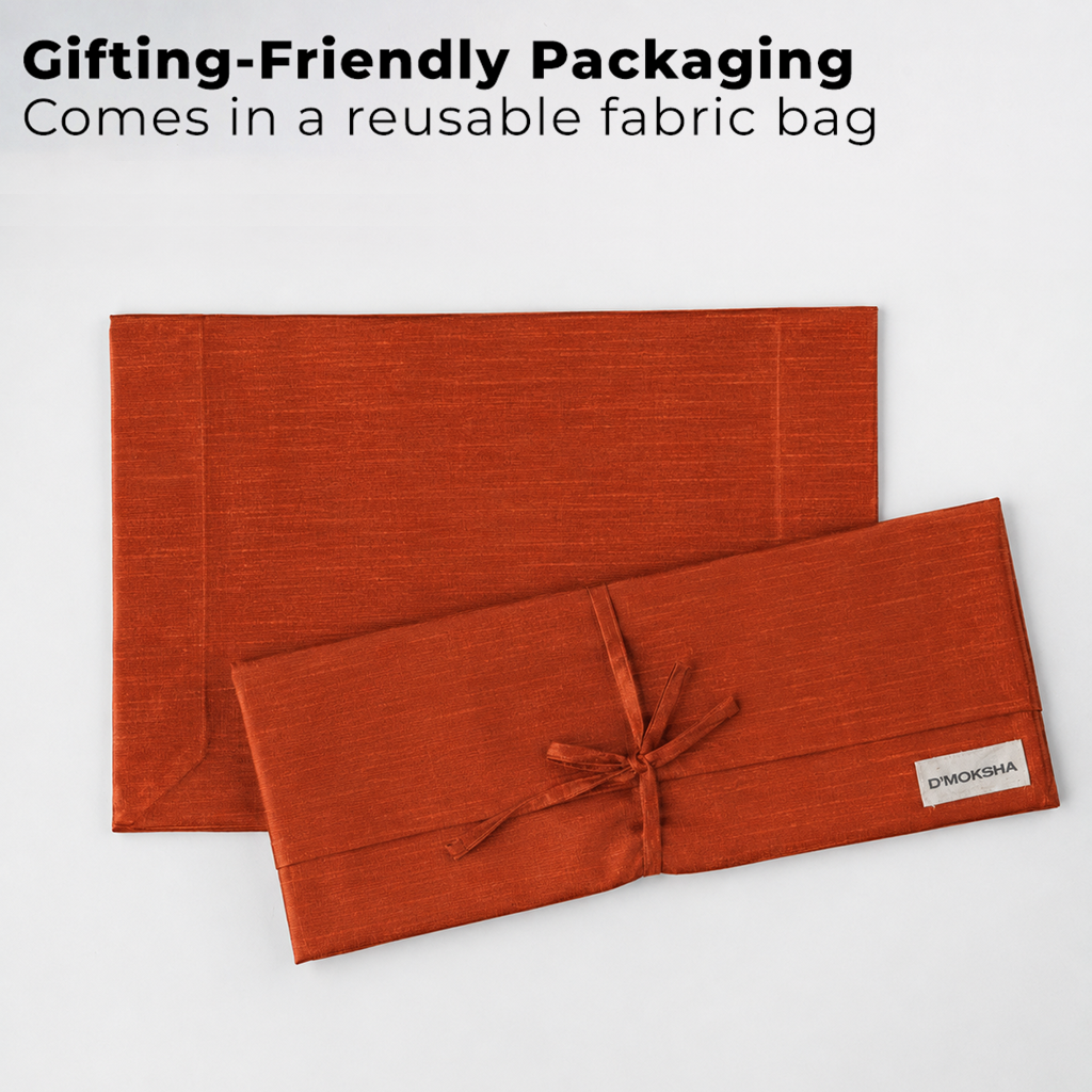 Rust Luxe Shine placemats with matching D'Moksha table linens