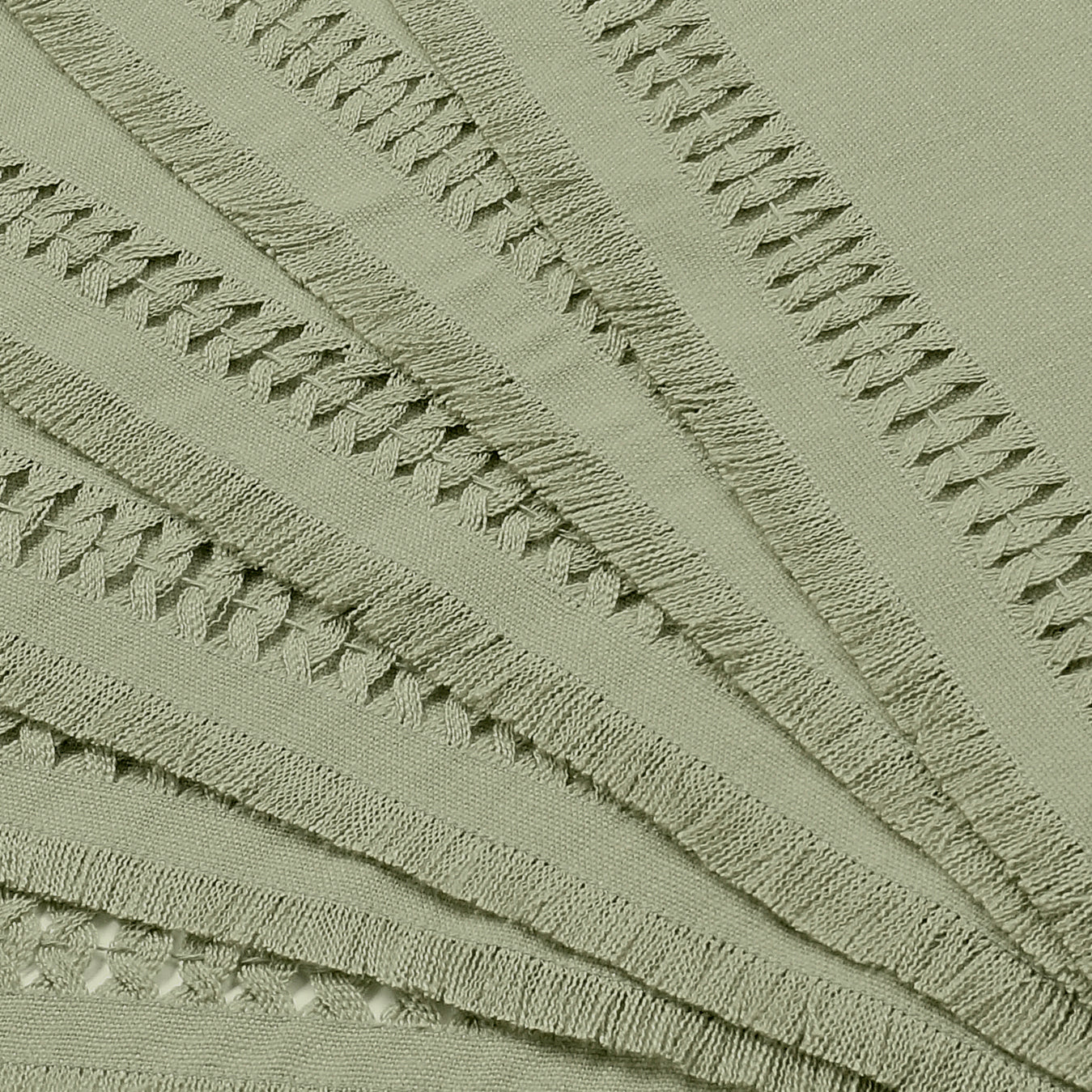 Sage green faux linen placemats with matching D'Moksha table linens