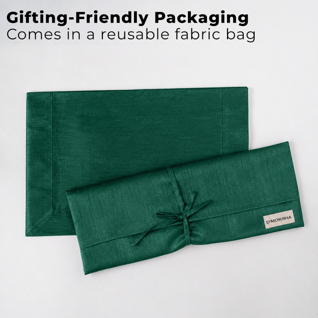 Emerald green Luxe Shine placemats with matching D'Moksha table linens