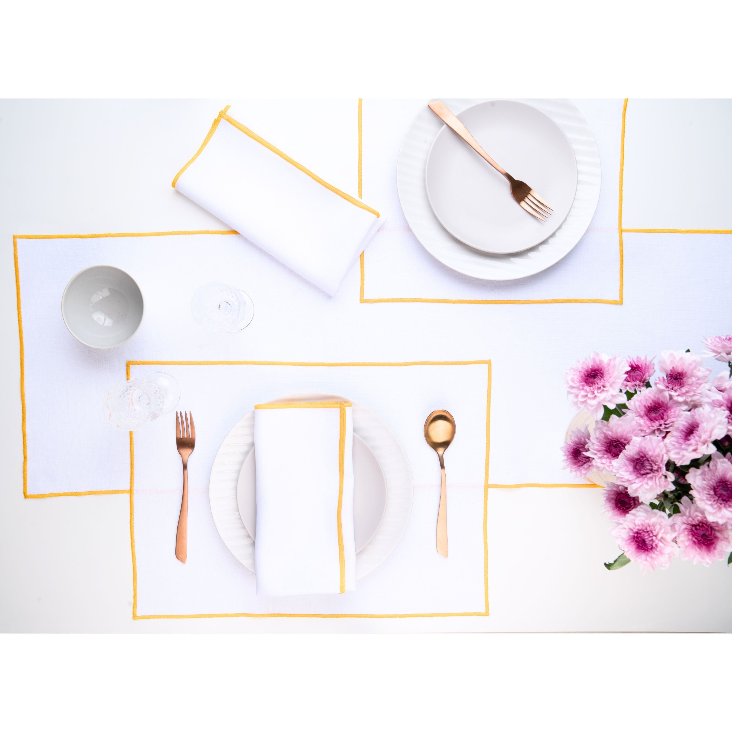 White and yellow pure linen table runner with matching D'Moksha table linens