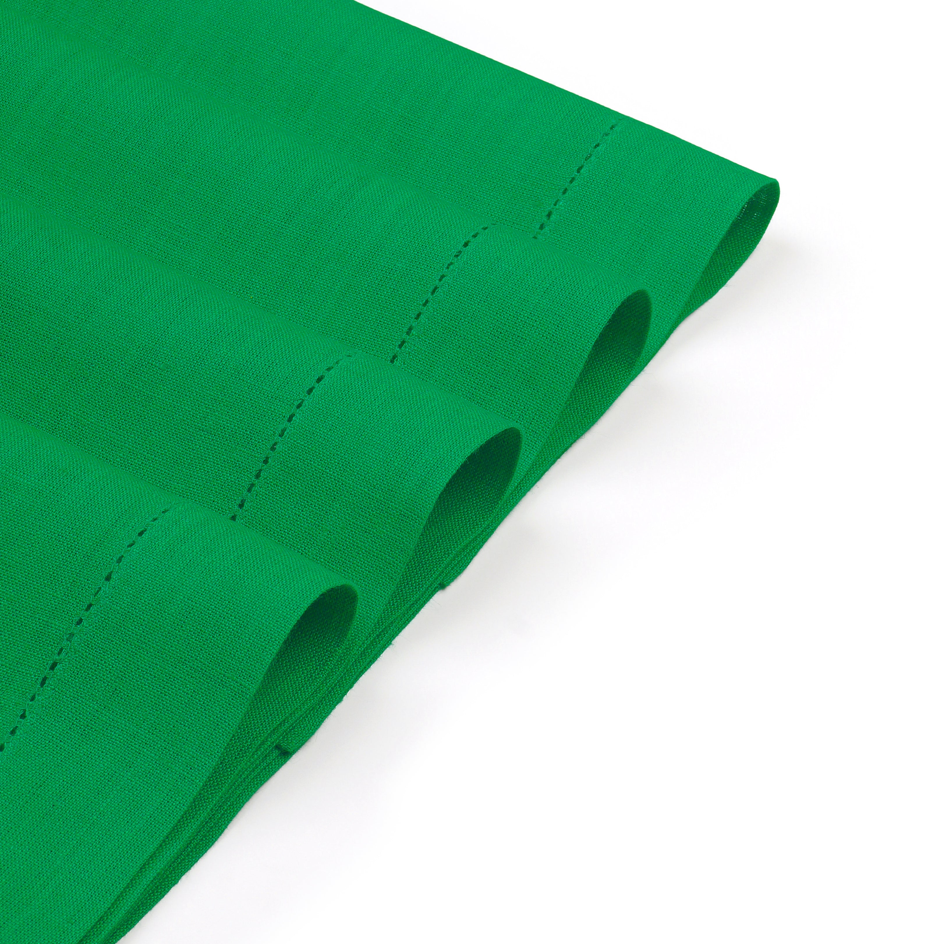Close-up of the hemstitch edge on kelly green pure linen placemats