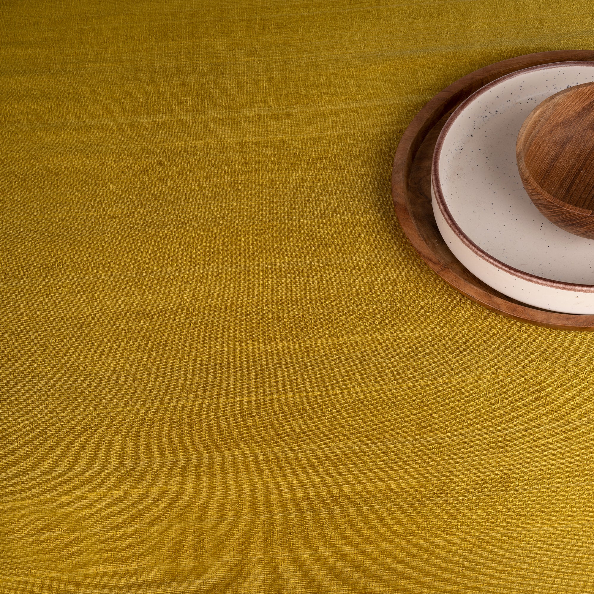 Gold Luxe Shine tablecloth with matching D'Moksha table linens
