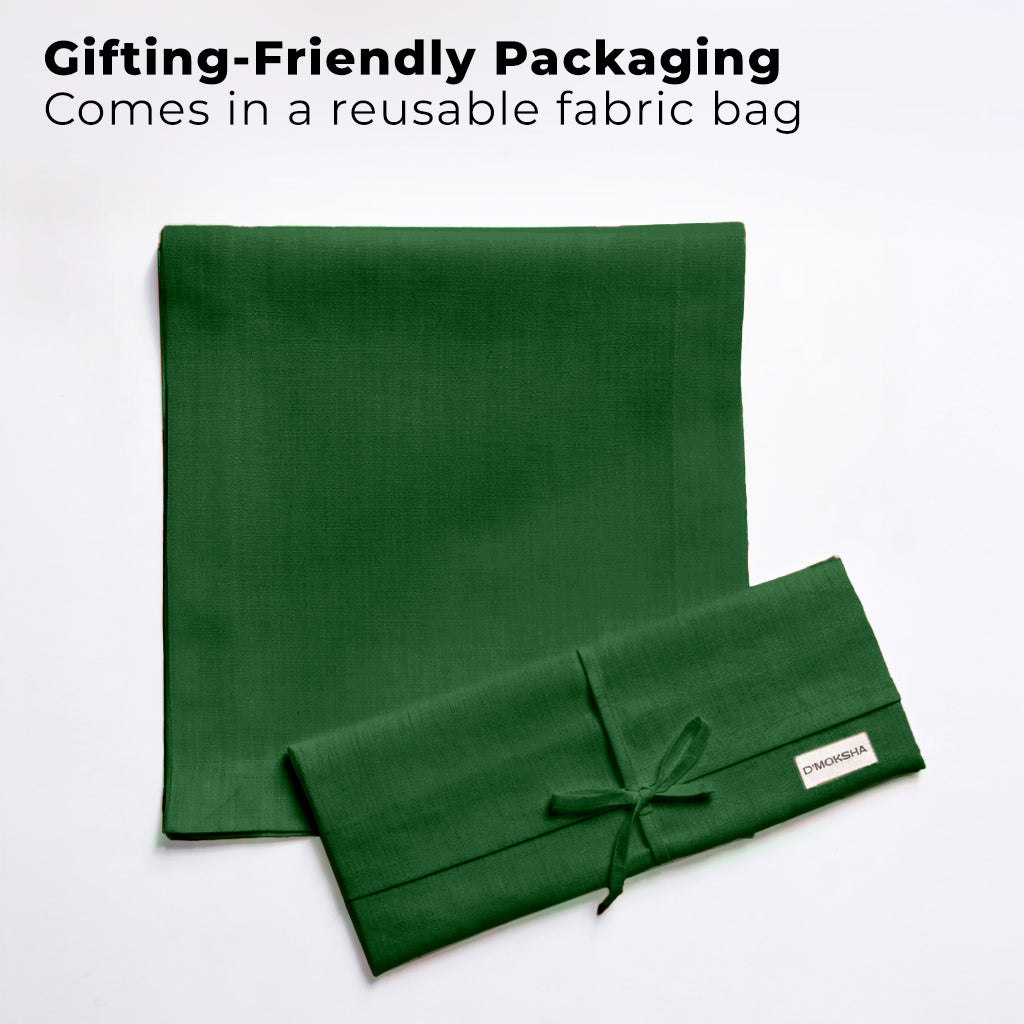 Forest green faux linen table runner with matching D'Moksha table linens