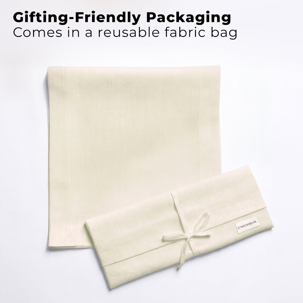 Ivory faux linen table runner with matching D'Moksha table linens