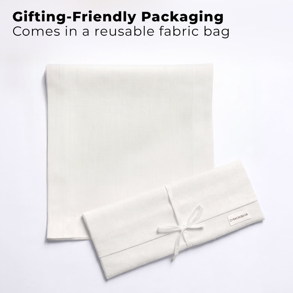 White faux linen table runner with matching D'Moksha table linens