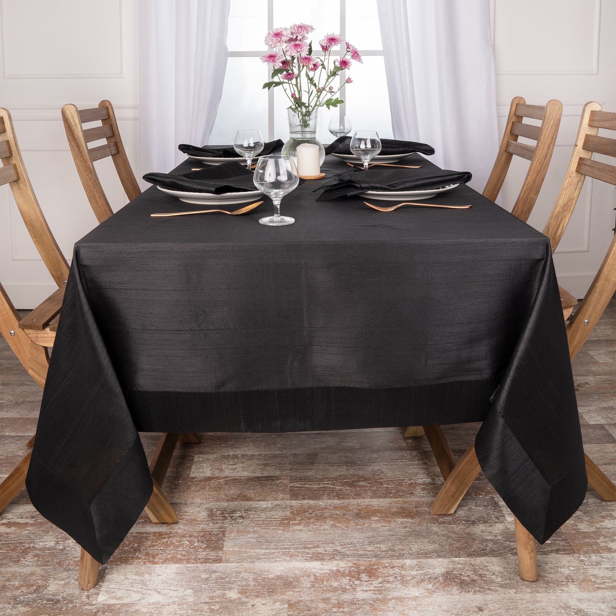 Black Luxe Shine tablecloth folded to show fabric texture