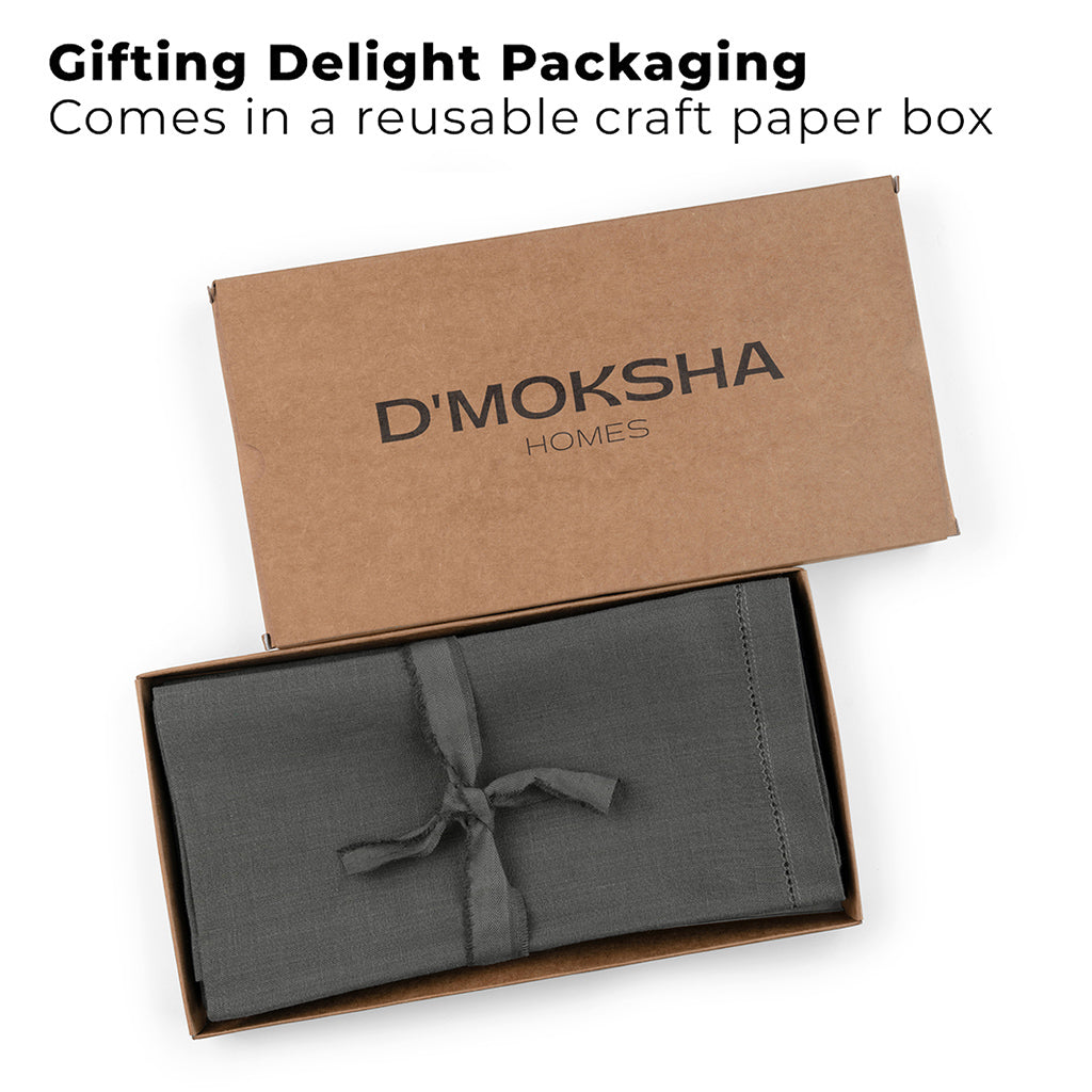 Charcoal grey pure linen dinner napkins folded to show fabric texture