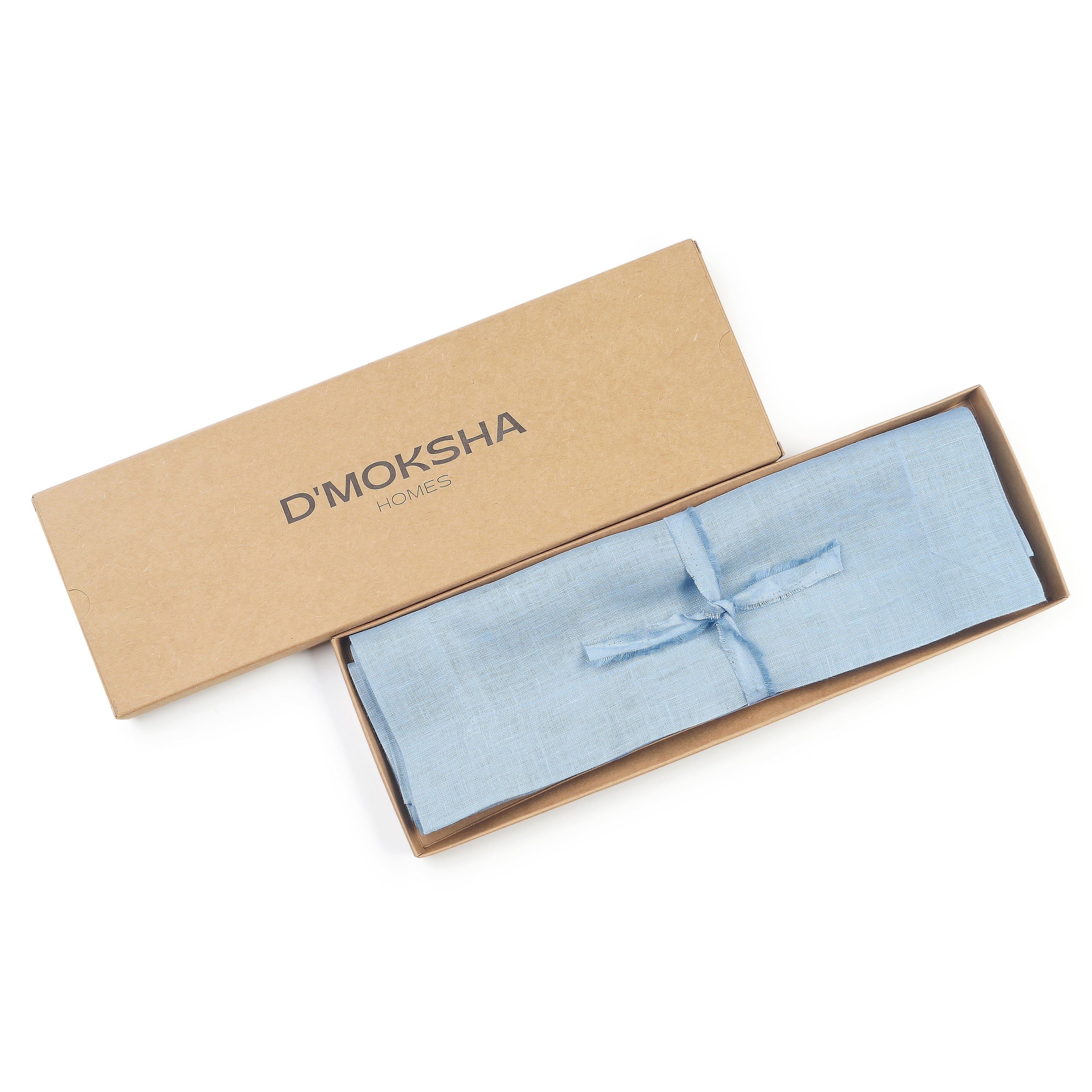 Powder blue pure linen placemats folded to show fabric texture