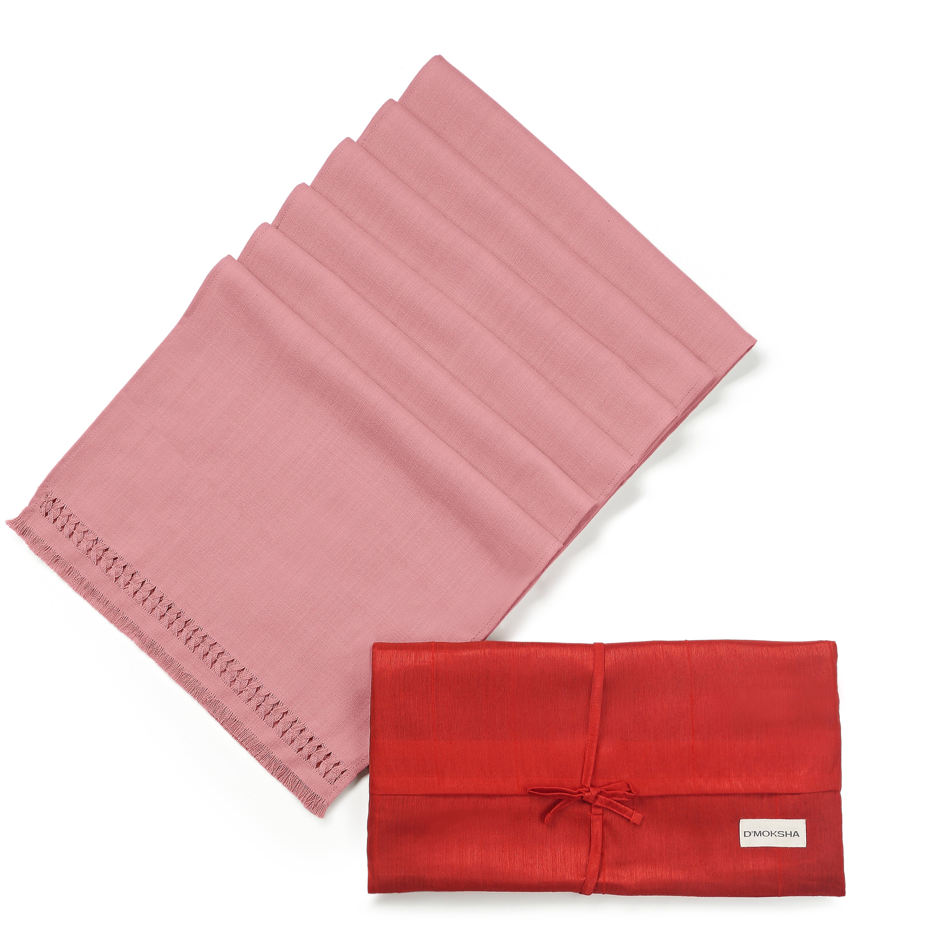 Dusty pink faux linen dinner napkins folded to show fabric texture