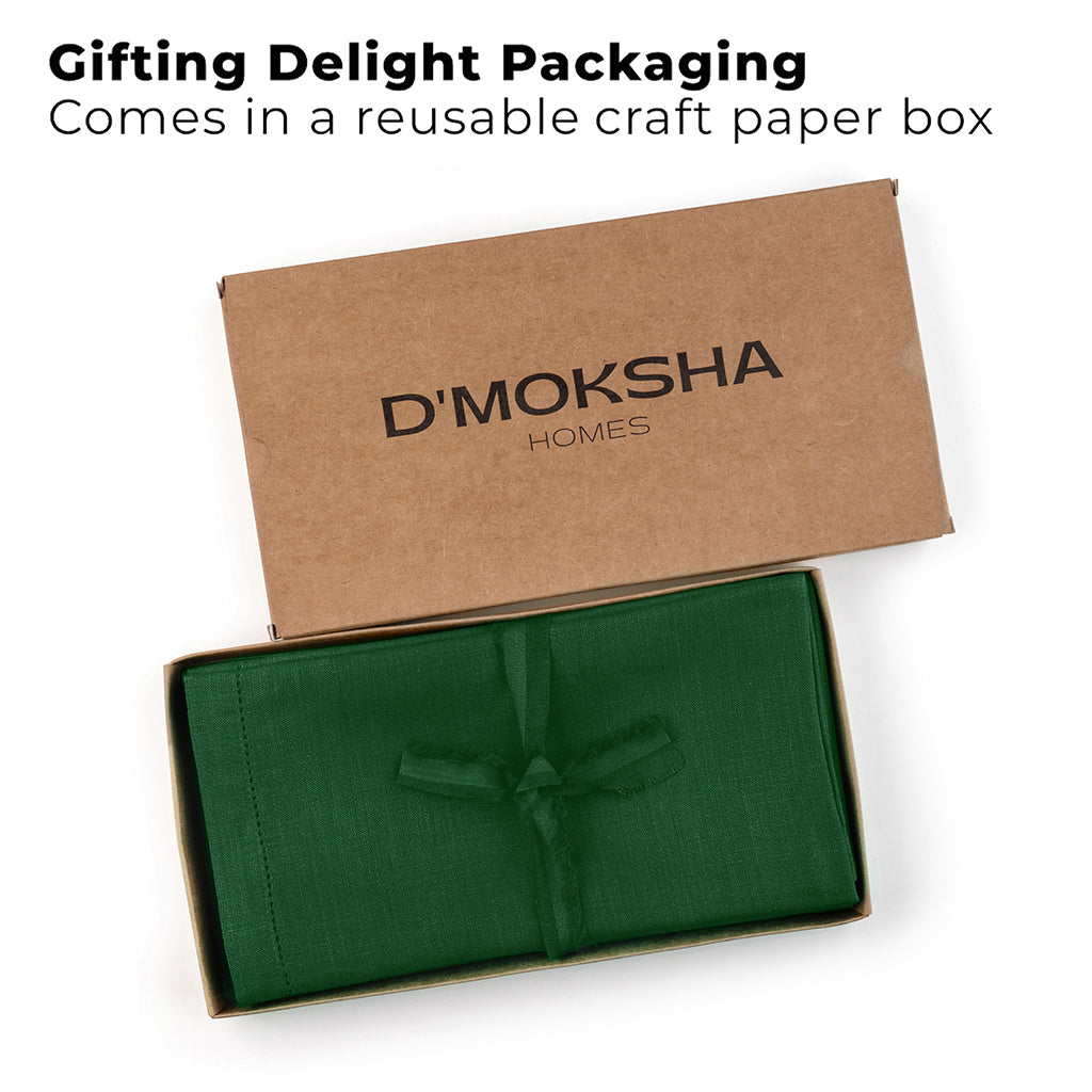 Forest green pure linen dinner napkins folded to show fabric texture