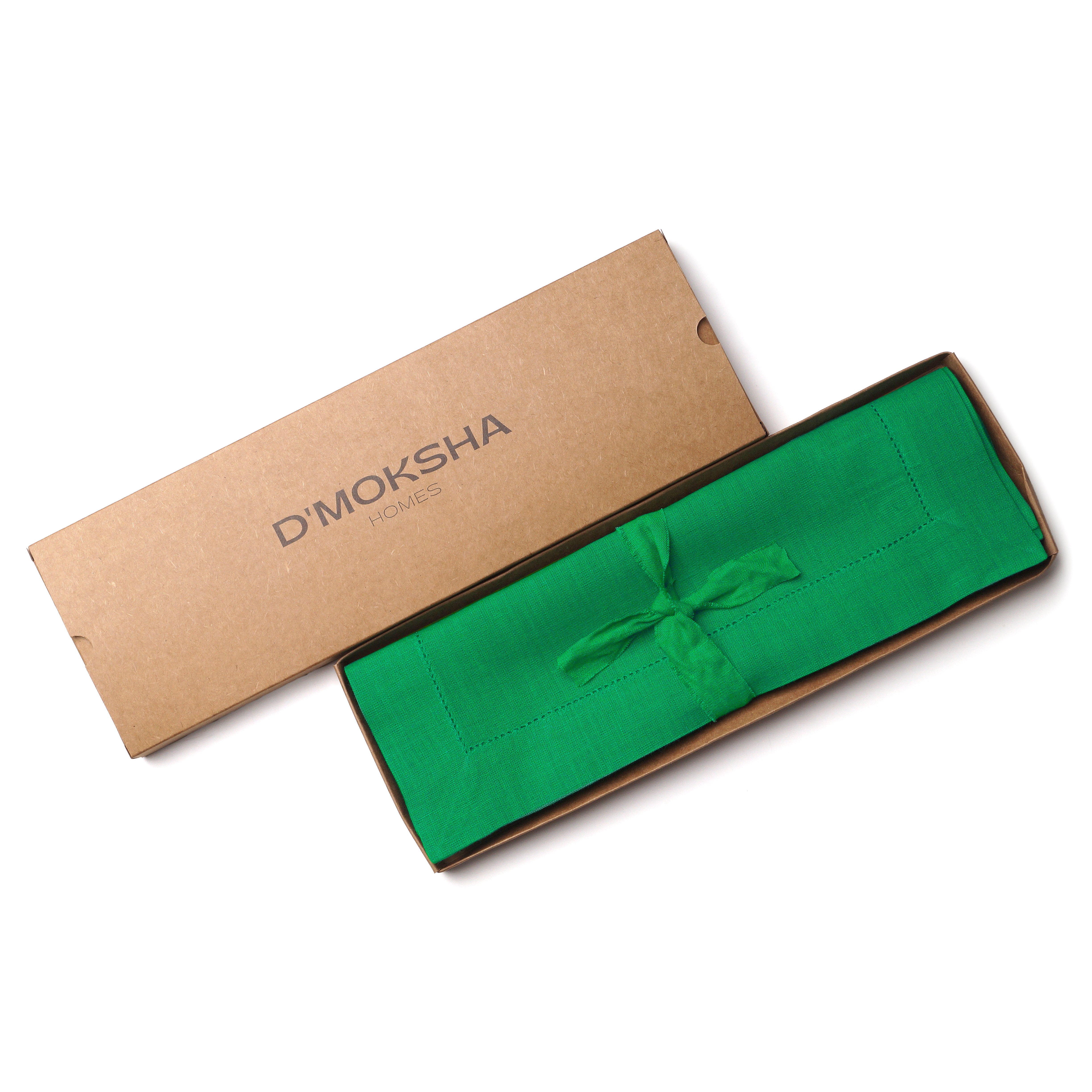 Kelly green pure linen placemats folded to show fabric texture