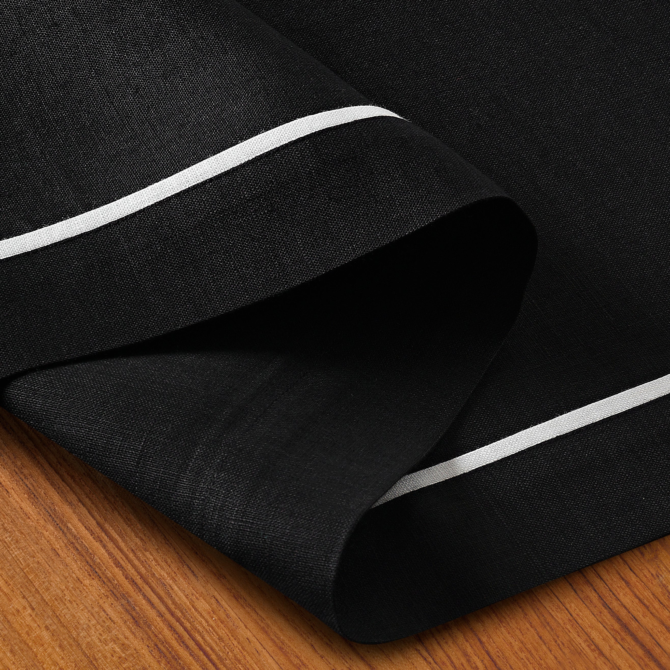 Black and white pure linen table runner with matching D'Moksha table linens