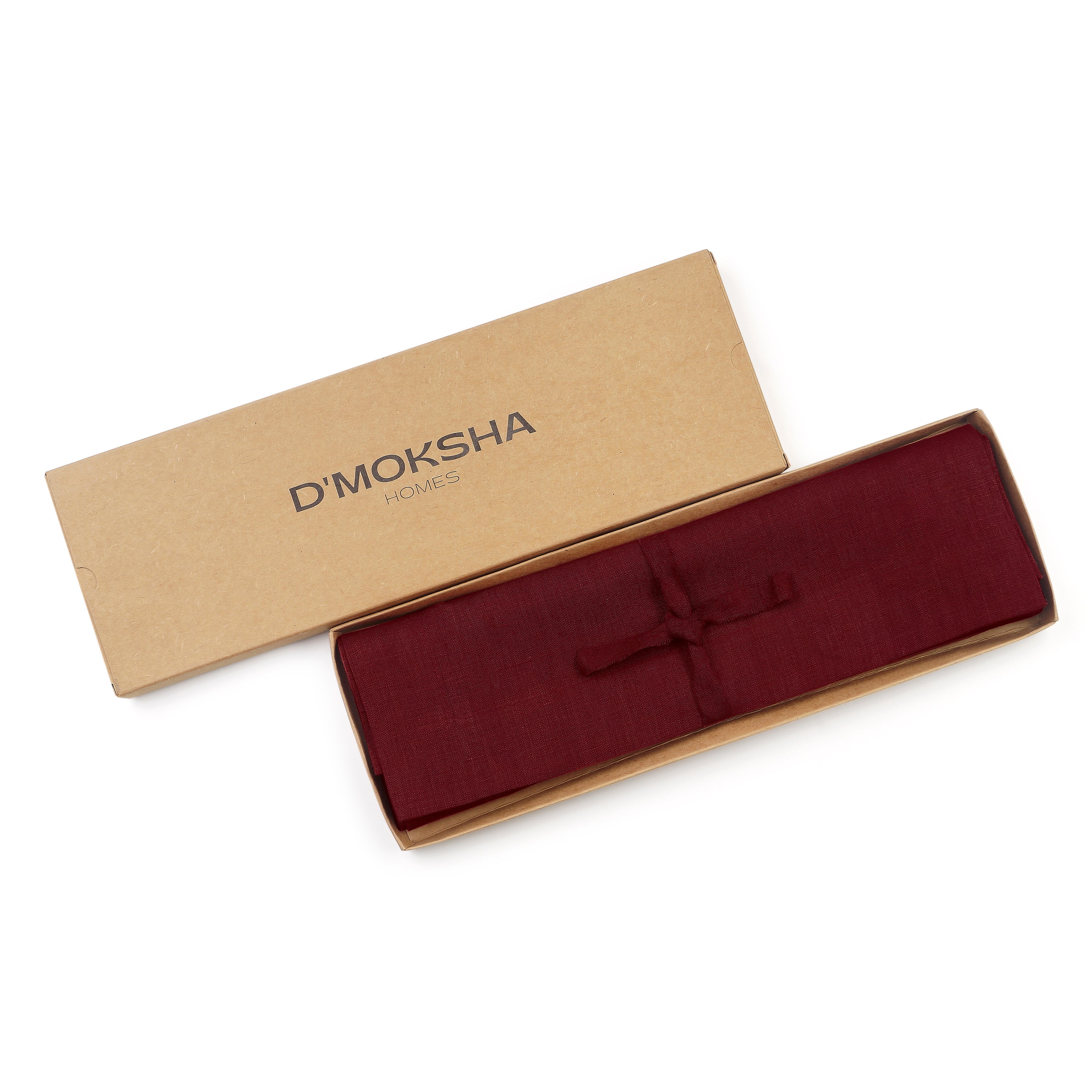 Dark red linen placemats folded to show fabric texture