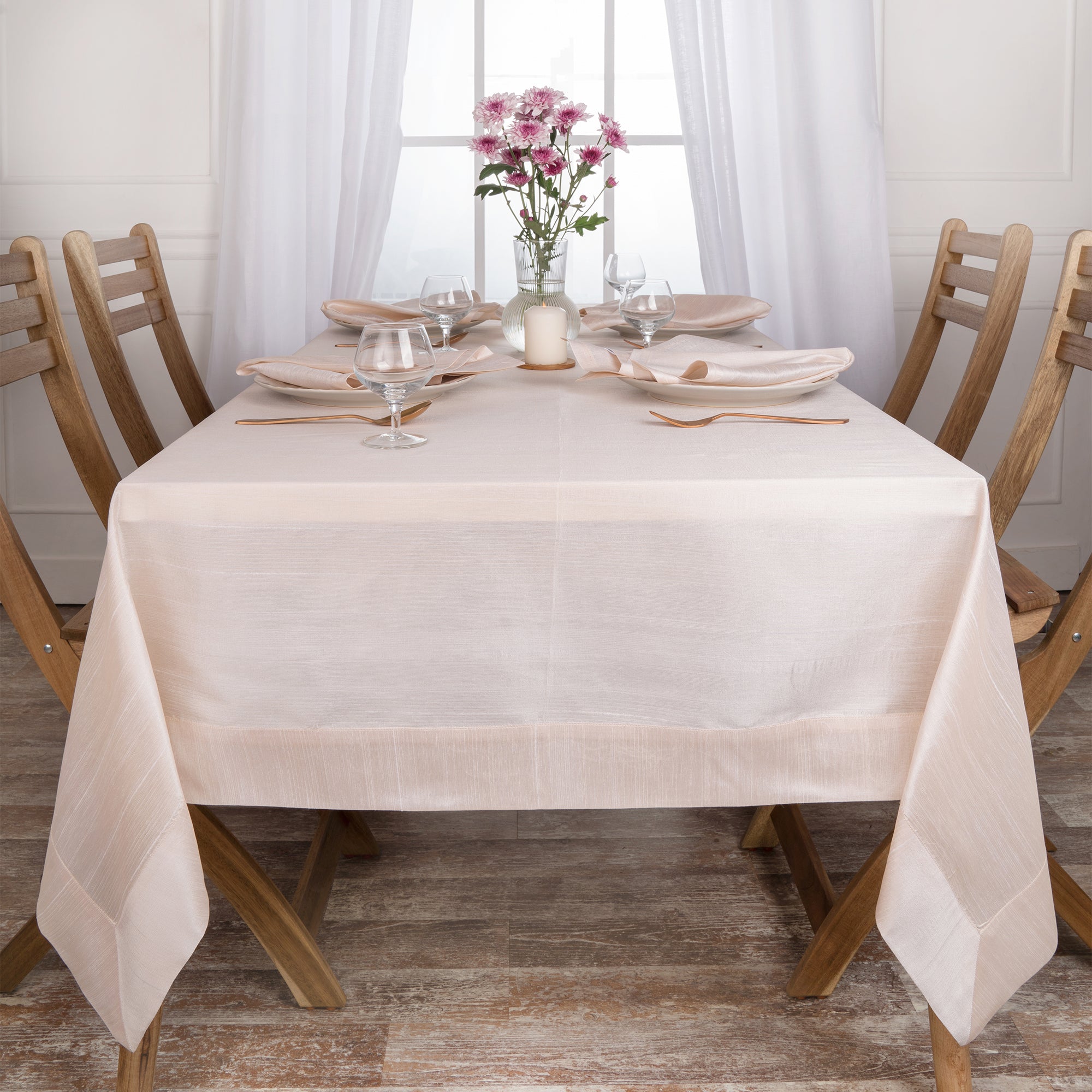 Light natural Luxe Shine tablecloth folded to show fabric texture