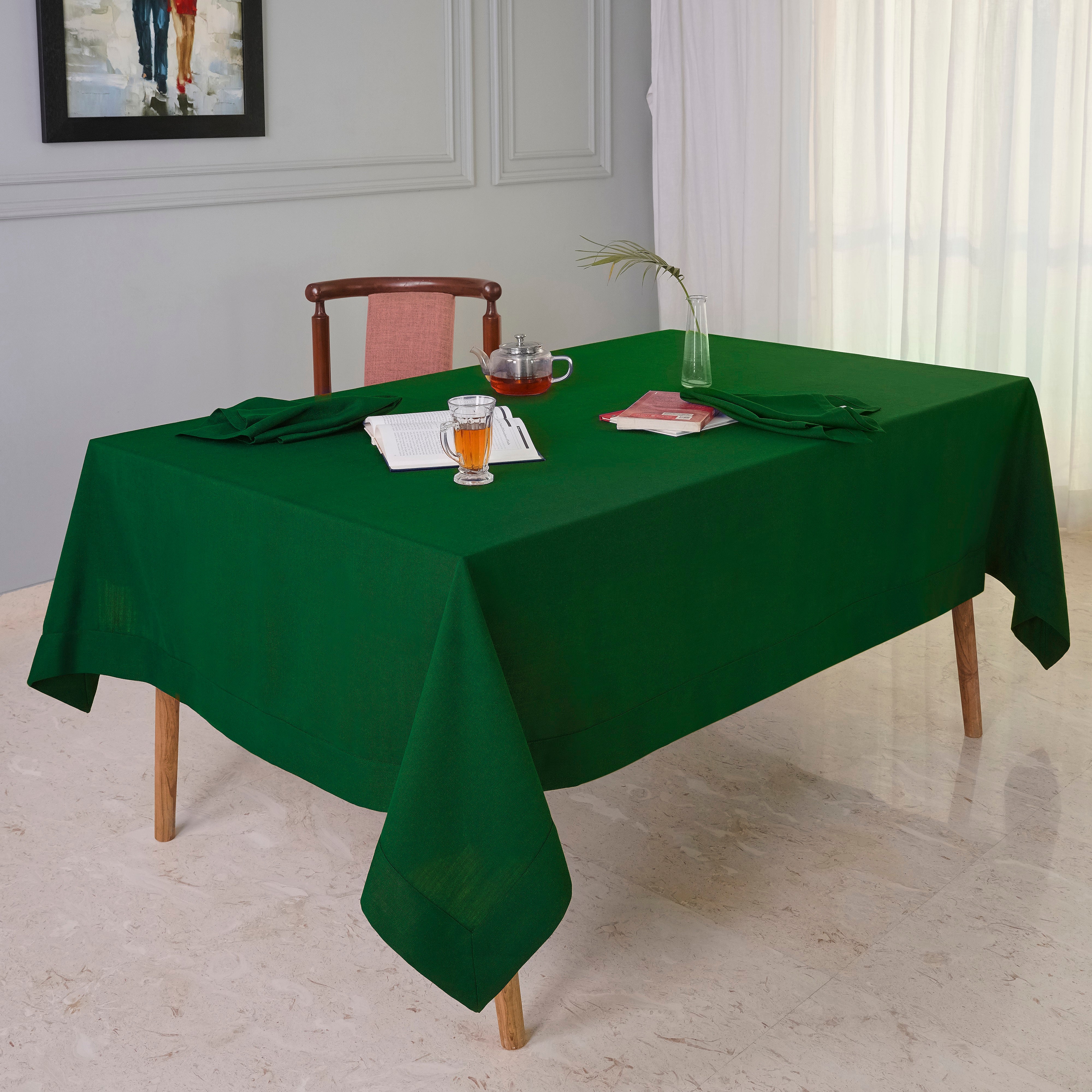 Eden green faux linen tablecloth folded to show fabric texture