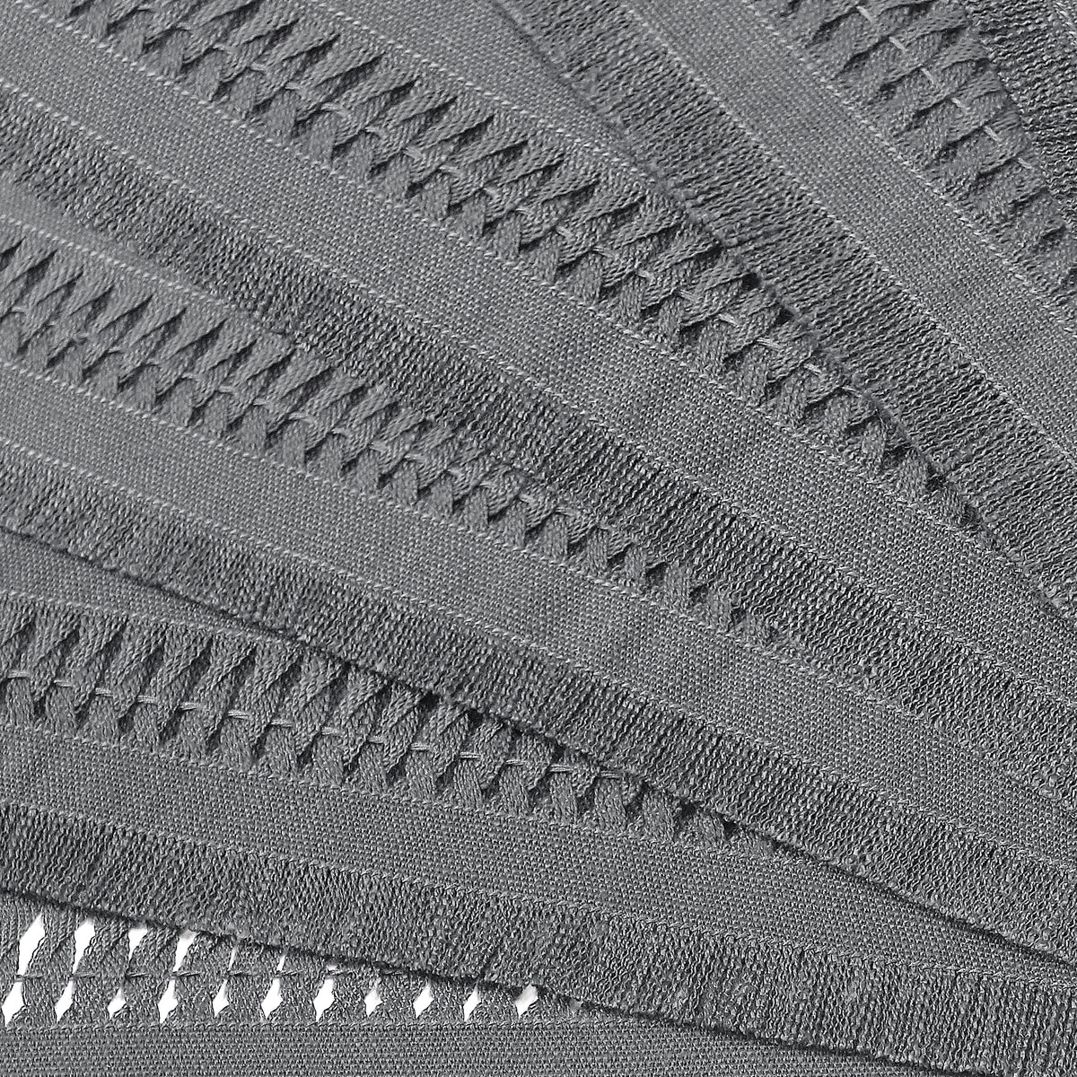 Close-up of the hand-hemstitch edge on charcoal grey faux linen dinner napkins