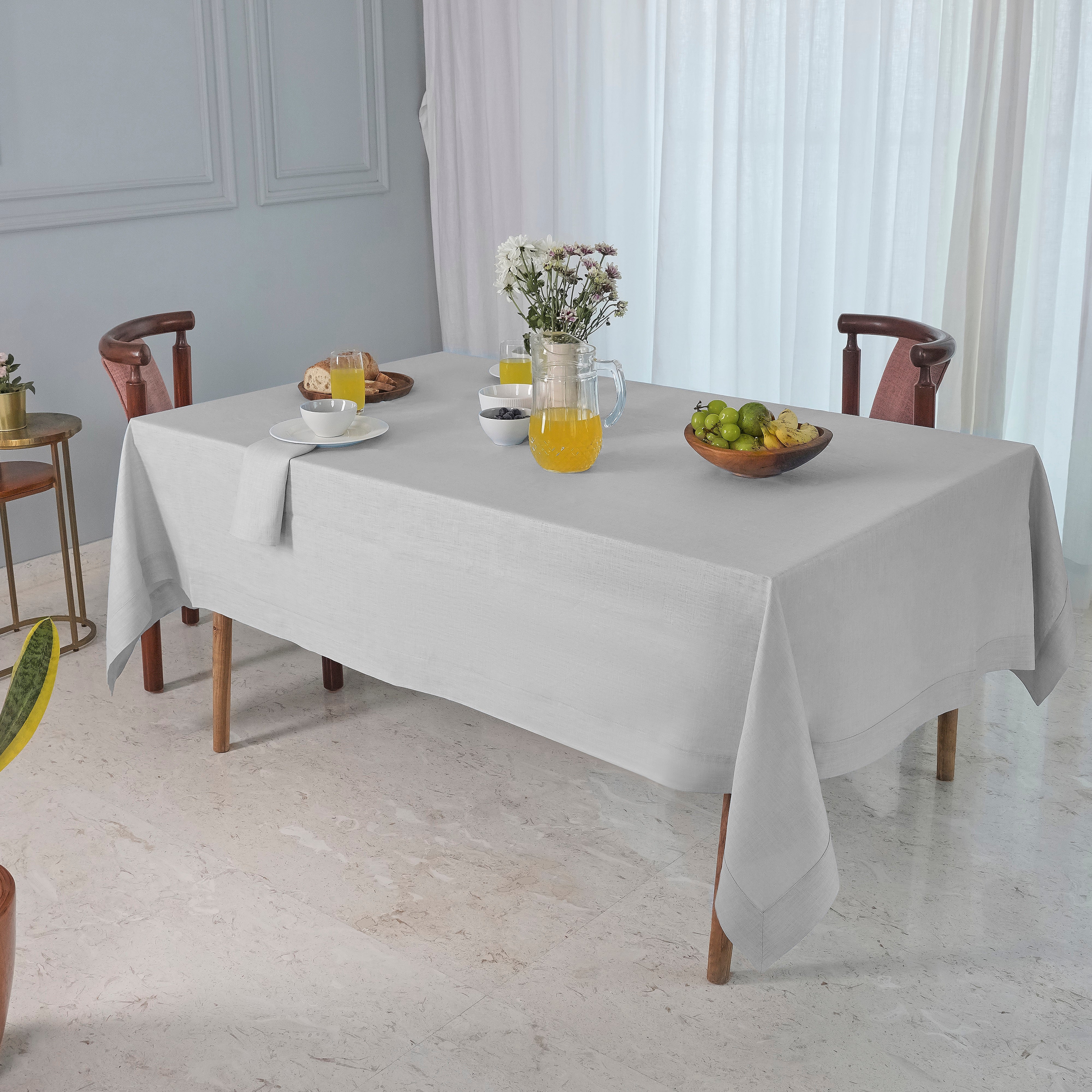 Silver grey pure linen tablecloth folded to show fabric texture