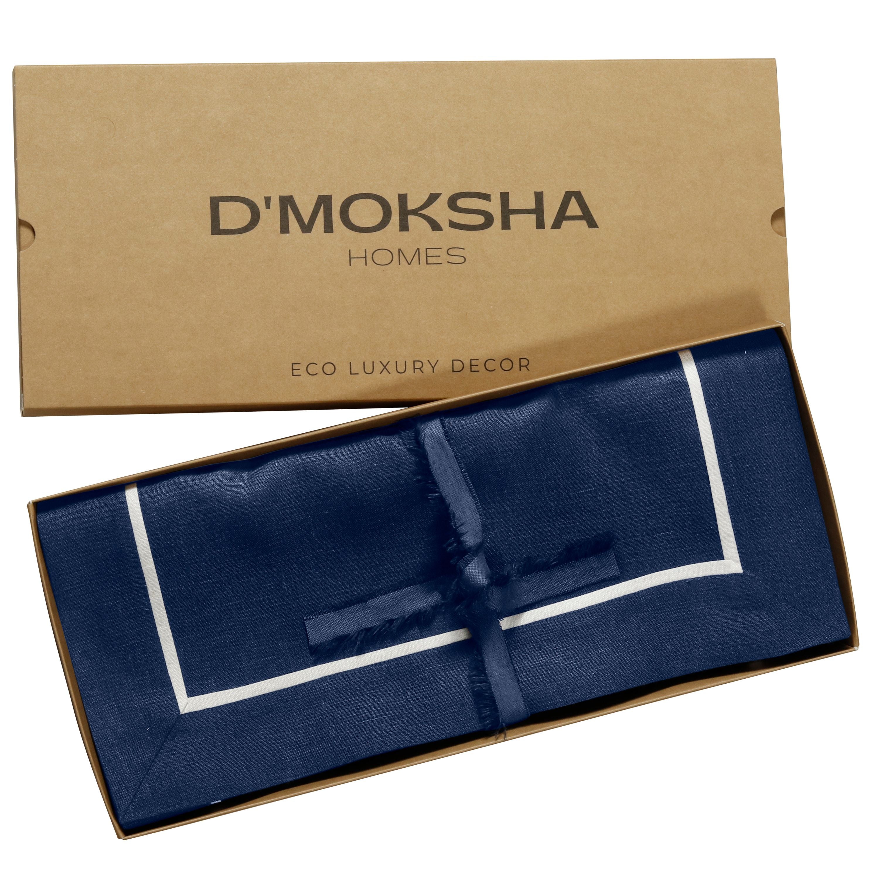 Navy blue and white pure linen placemats folded to show fabric texture