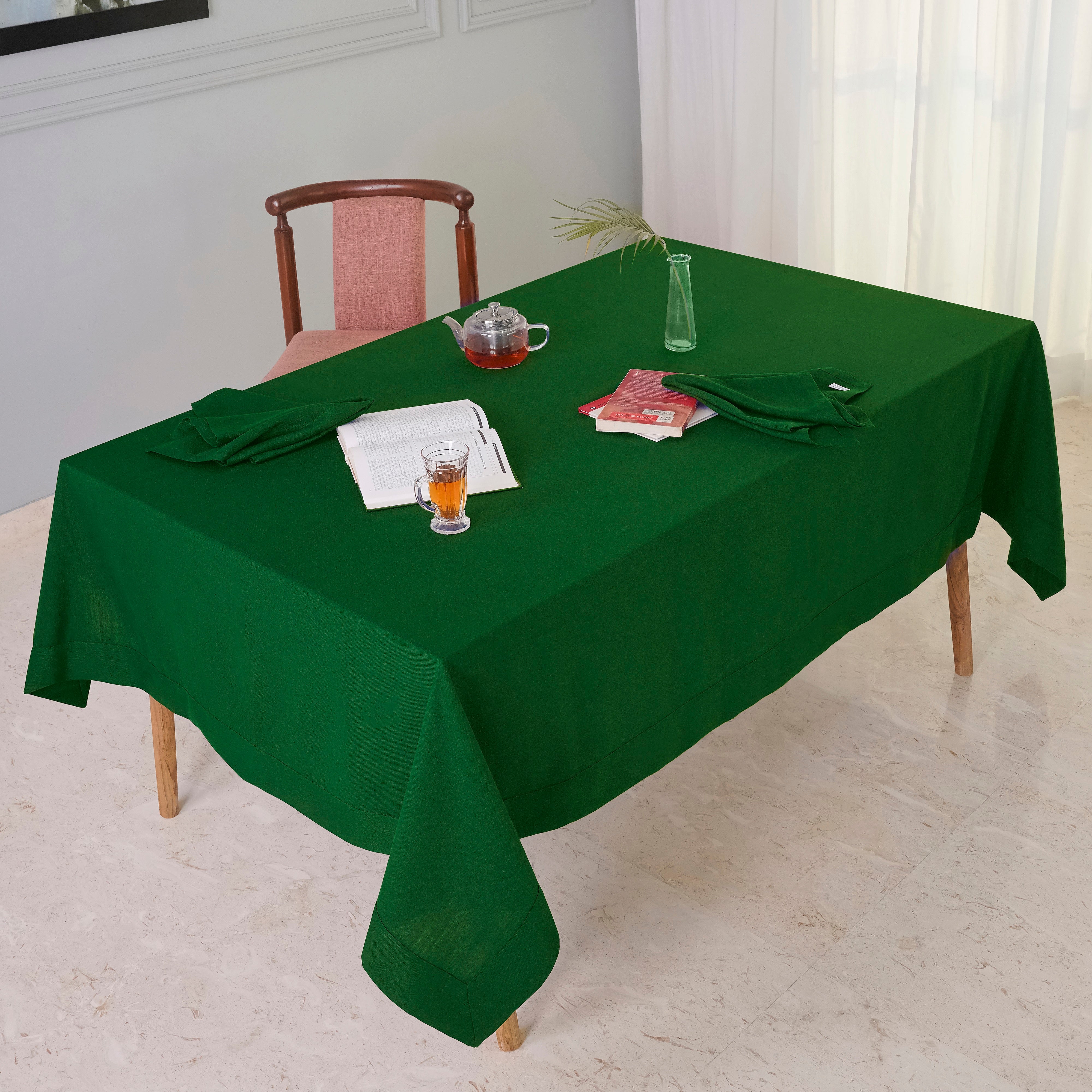 Eden green faux linen tablecloth in a set table setting